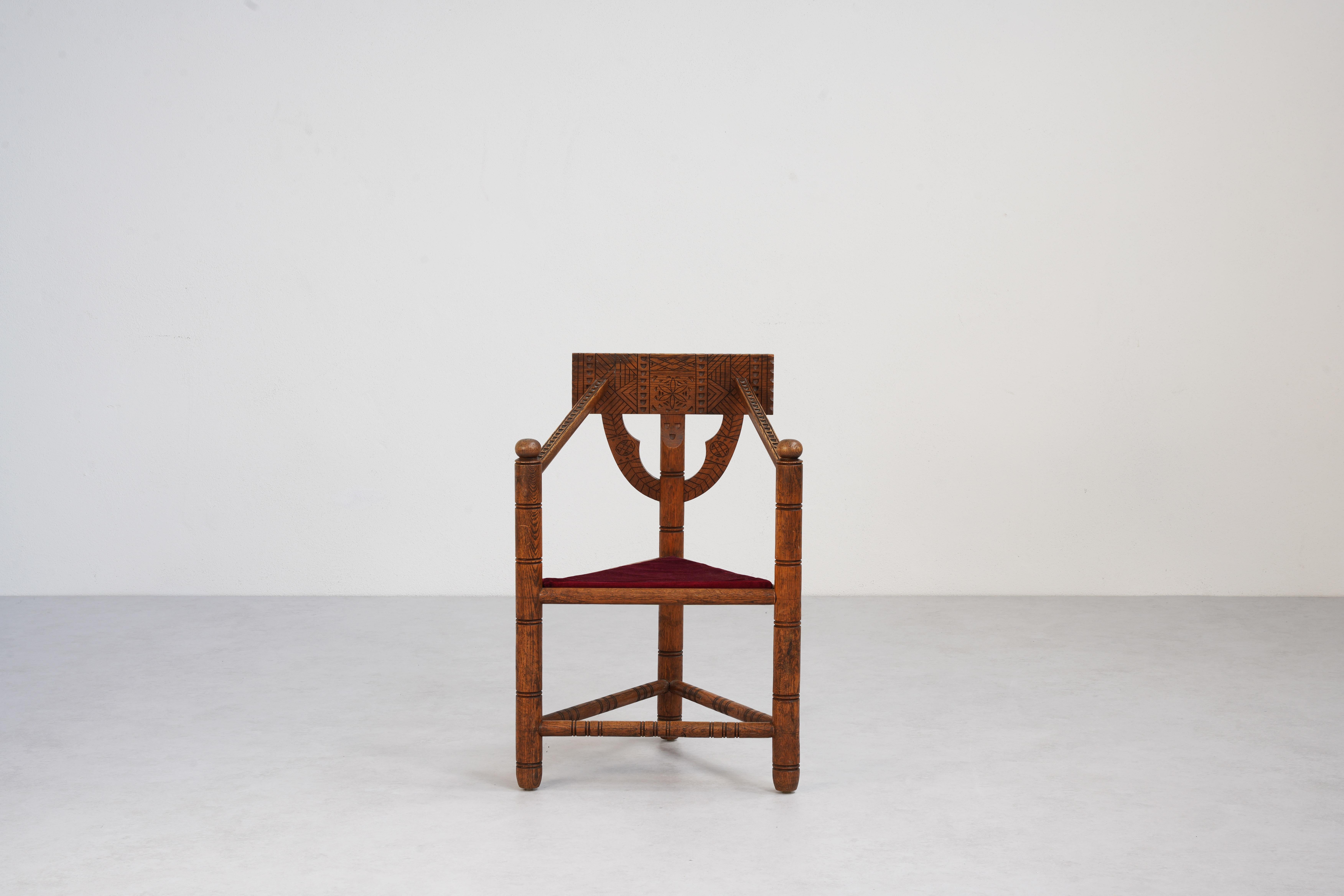 1930s Masterpiece: Carved Oak Chair with Timeless Craftsmanship attributed to Bernhard Hoettger, Künstlerkolonie Worpswede

In the vibrant late 1930s, a remarkable oak chair emerged, showcasing exquisite craftsmanship and intricate carvings that