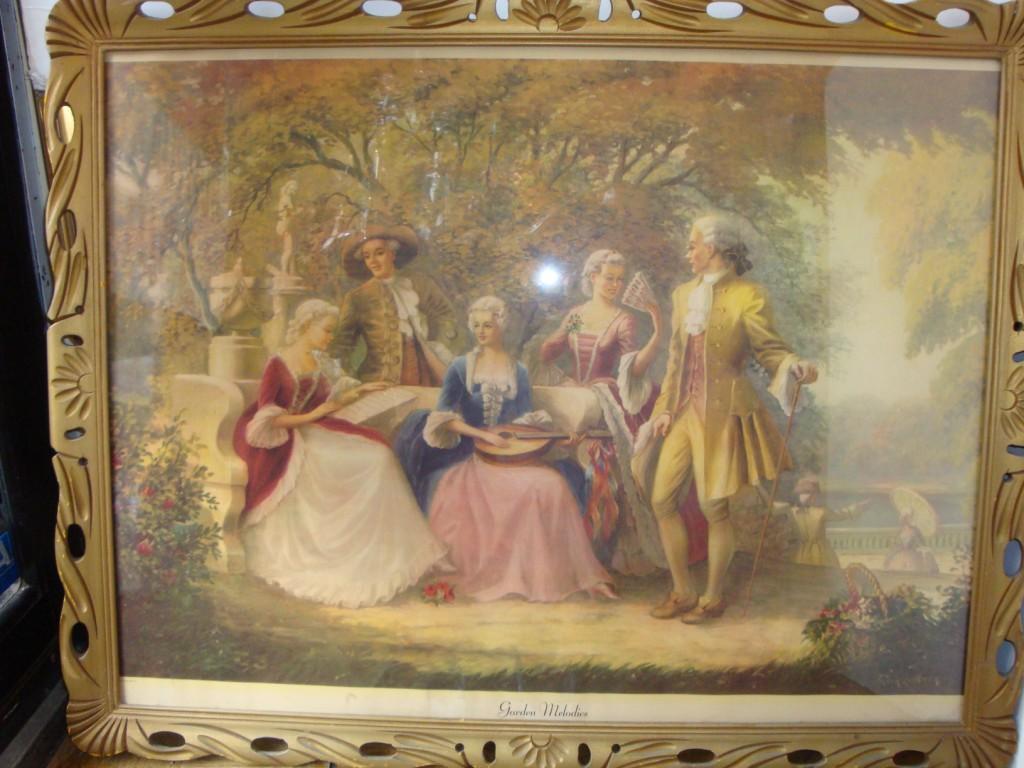 The Following Item we are offering is a STUNNING AND RARE Framed Lovers in Courtyard Scene featuring 18th/19th Century Men and Women adorned in Lavish and Colorful Clothing sitting in a Garden with a Woman holding a Mandolin. Titled 