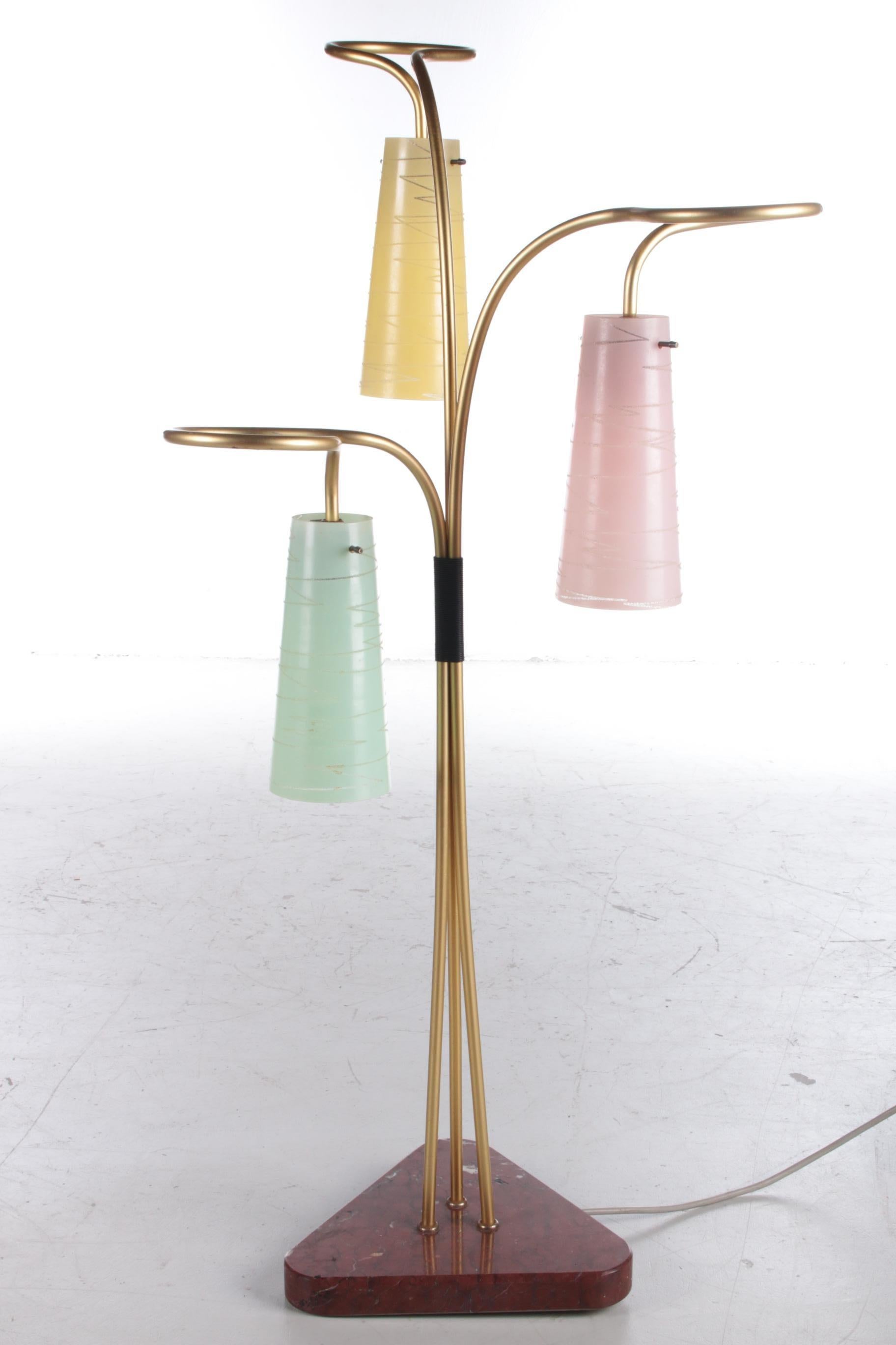Beautiful rare floor lamp from the old DDR, 1950


This is a beautiful ornate 1950s floor lamp made of a heavy marble base.

With beautiful brass tubes nicely turned with the beautiful lampshades of colored thin glass.

If you want something