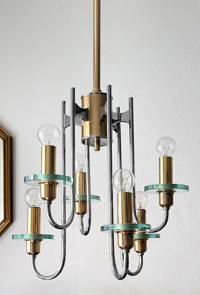 Elegant and beautiful midcentury six-arm pendant chandelier. 
The overall height can be customized.
Italy, 1960s-1970s.
Measures: Height of the body: 17 in (43 cm).
Lamp sockets 6.