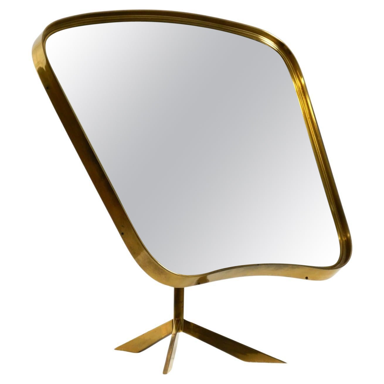 Beautiful rare large adjustable mid-century brass table mirror by Zier Form