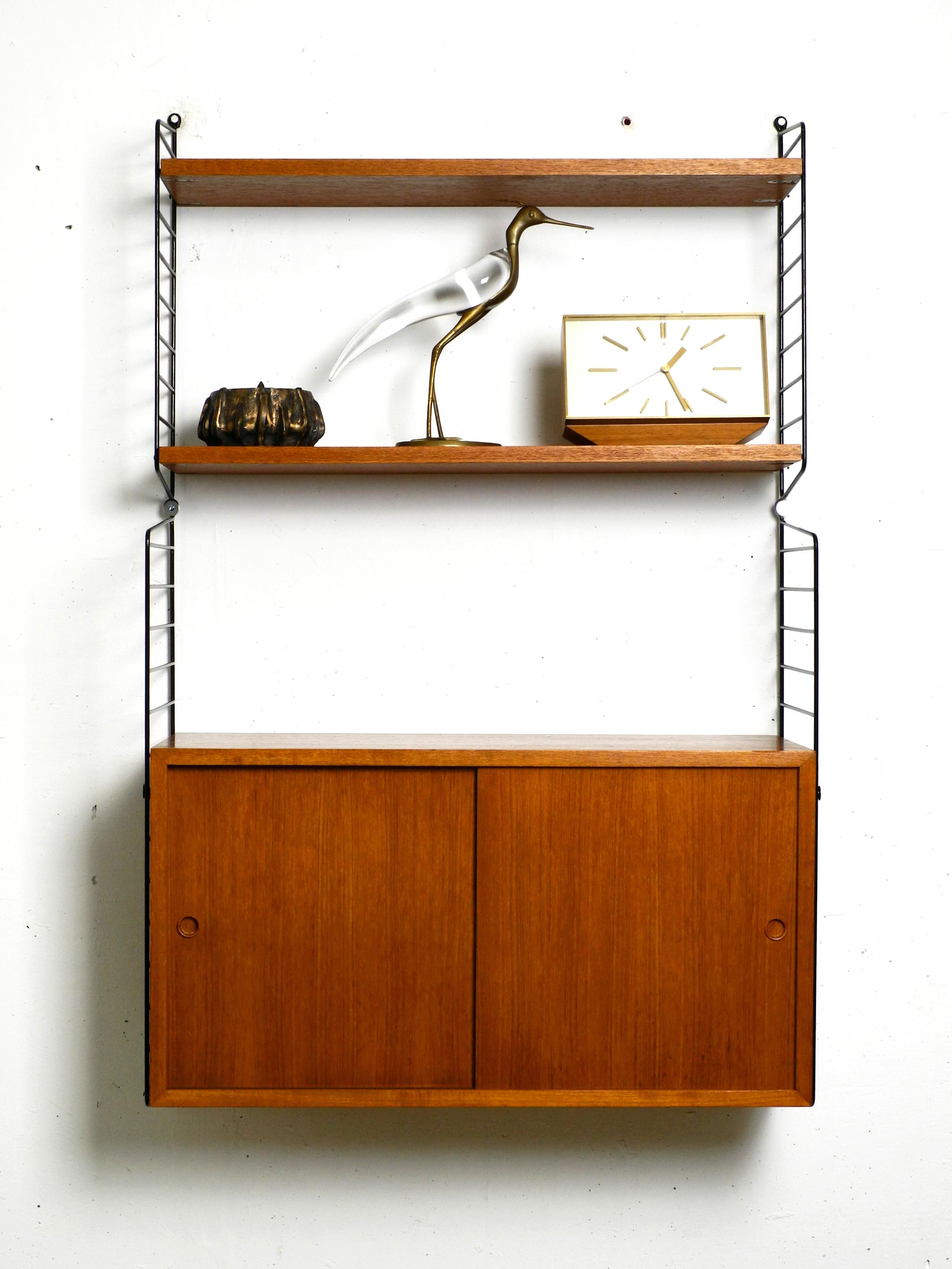 Original 1960s Nisse Strinning teak string shelf with 2 shelves and one cupboard 3