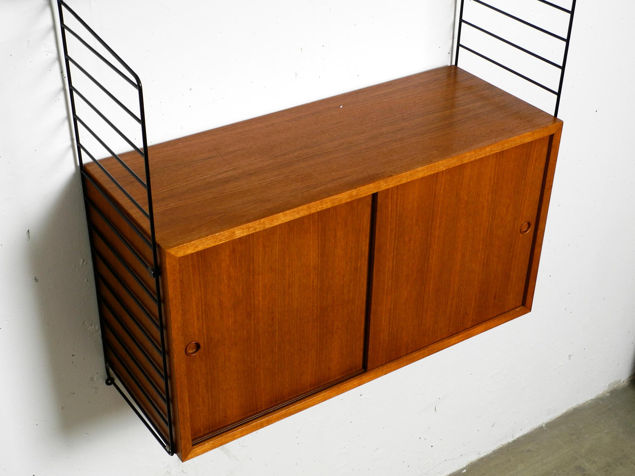 Mid-Century Modern Original 1960s Nisse Strinning teak string shelf with 2 shelves and one cupboard