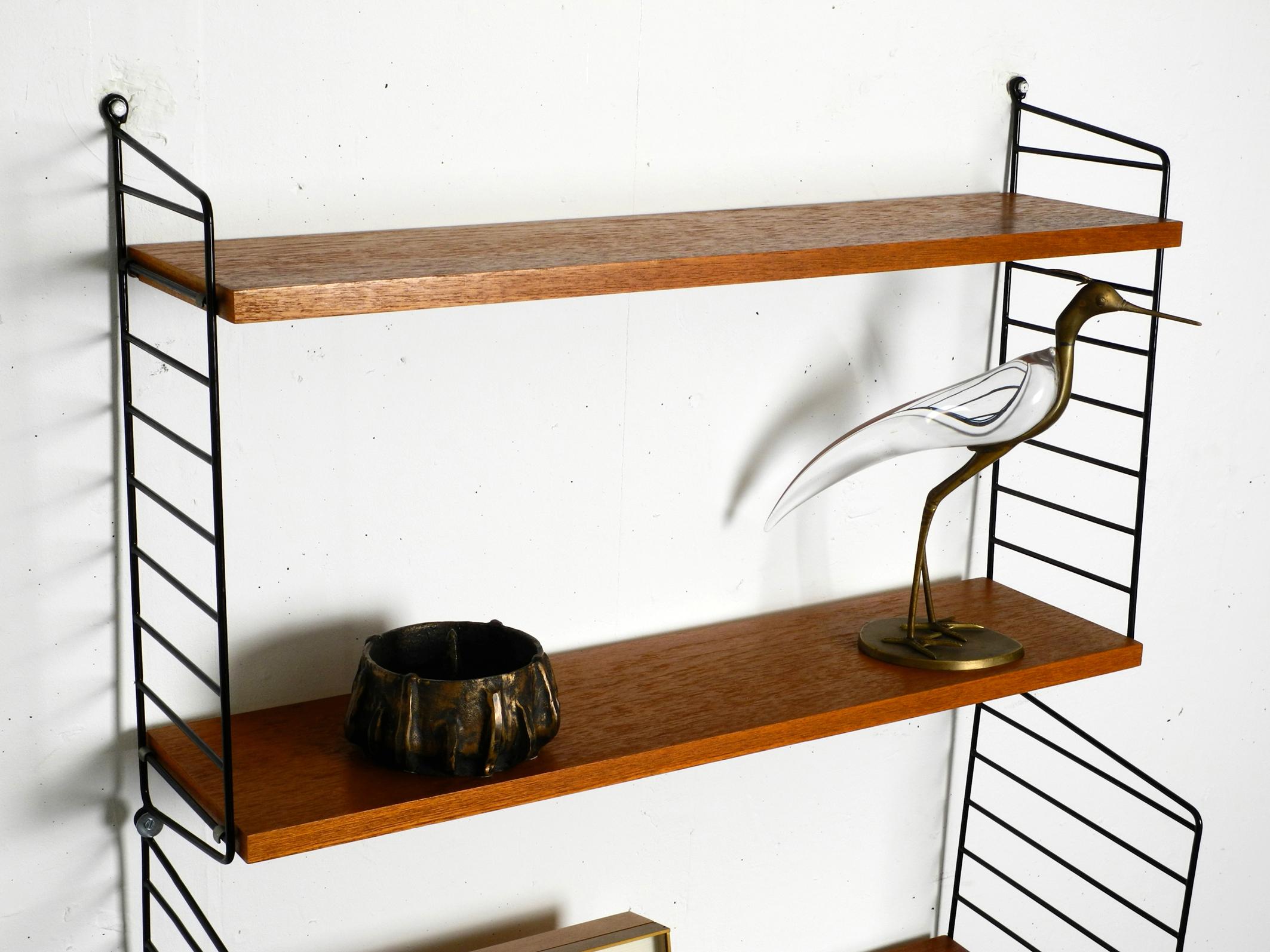 Original 1960s Nisse Strinning teak string shelf with 2 shelves and one cupboard In Good Condition In München, DE