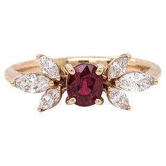 Schöner roter Rubinring mit erdfarbenen Diamanten in massivem 14K Gelbgold Oval 5x4