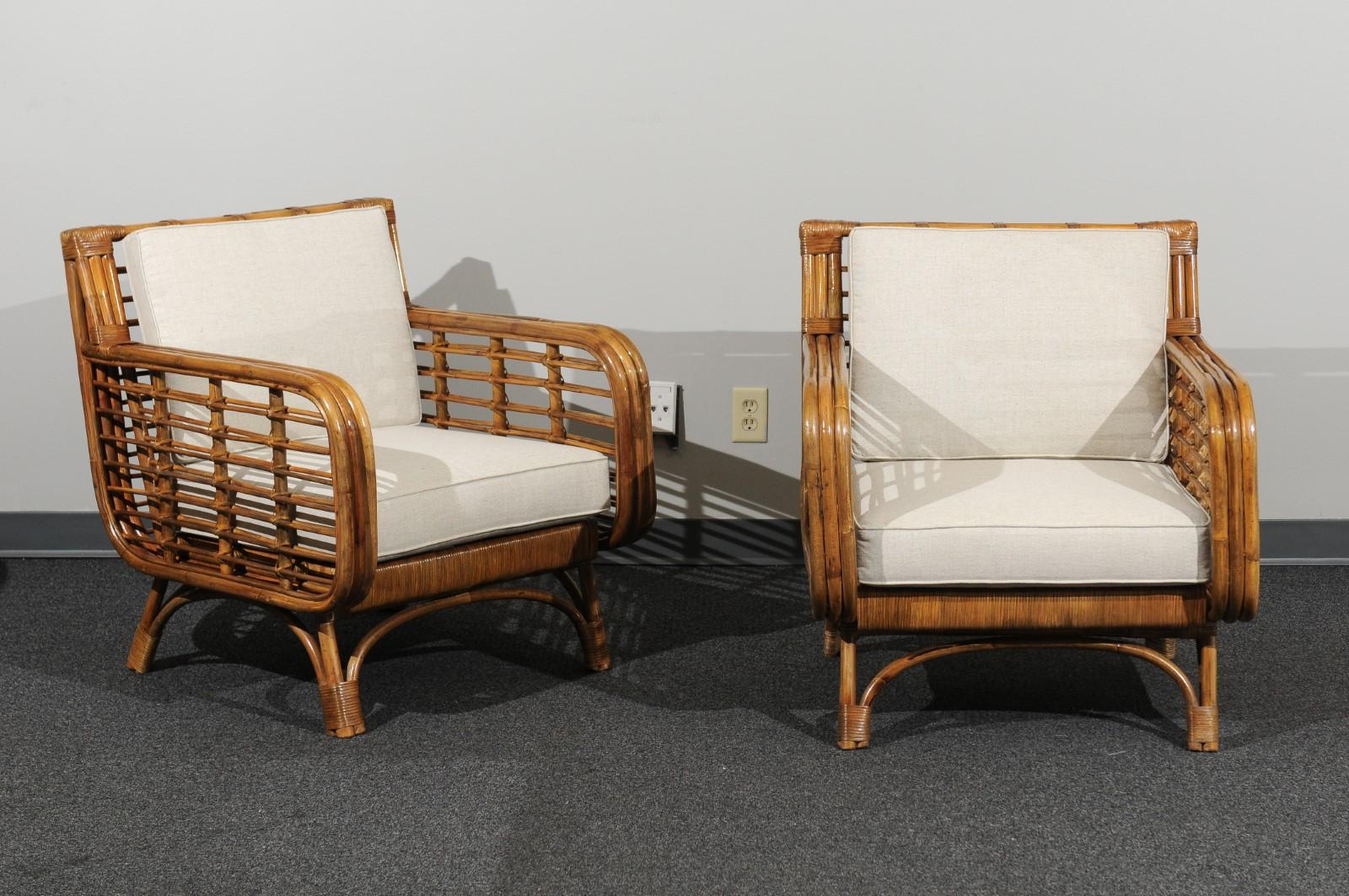 These magnificent lounge chairs are shipped as professionally photographed and described in the listing narrative: Meticulously professionally restored and installation ready. Expert custom upholstery service is available.

A fabulous pair of