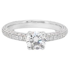 Beautiful Ring with a dazzling 0.65 carat Round Brilliant natural diamond
