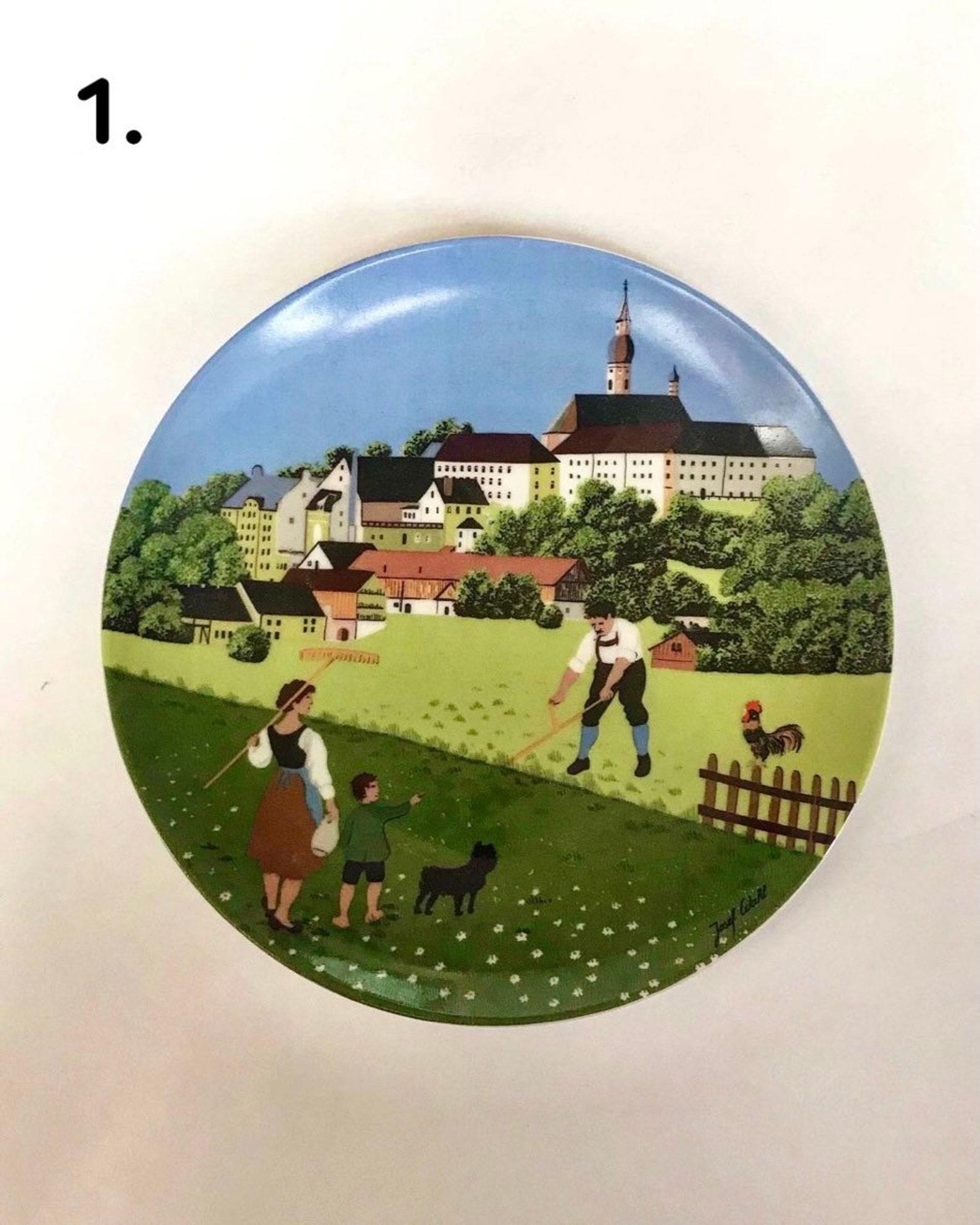 Lovely decorative plates “Morning”, “Noon”, “Evening” and “Night”, produced by the privileged royal porcelain factory Royal Tettau in collaboration with illustrator Josef Wahl.

Limited edition.

Germany. 

1970s.

In excellent condition, no