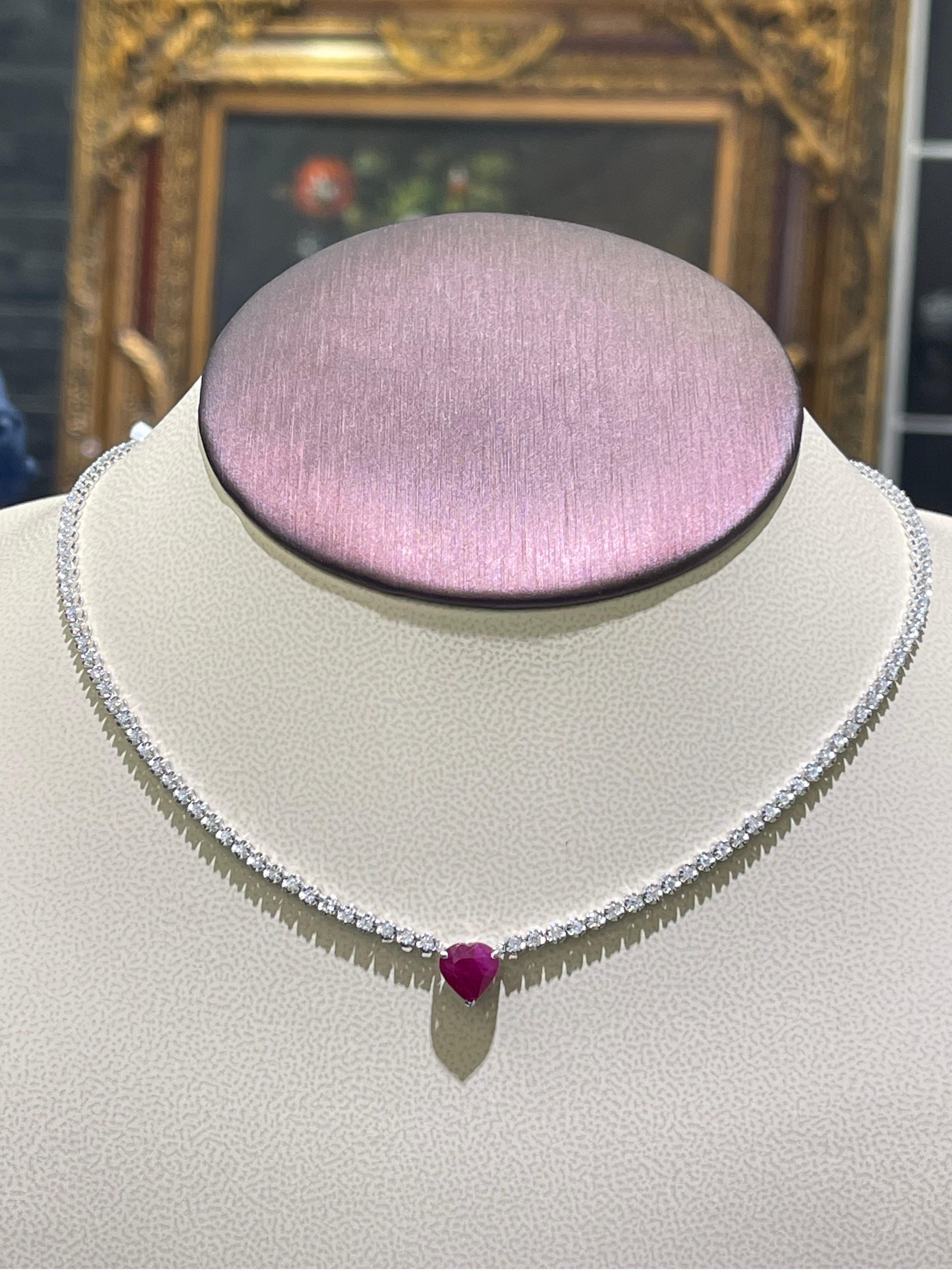 Beautiful Ruby And Diamond Necklace In 18k White Gold ,

- 1.95 diamonds total carat weight,

- 2.30 carats in heart shaped Ruby,

- necklace length is 16”