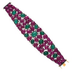 Magnifique bracelet cabochon de rubis et d'émeraudes