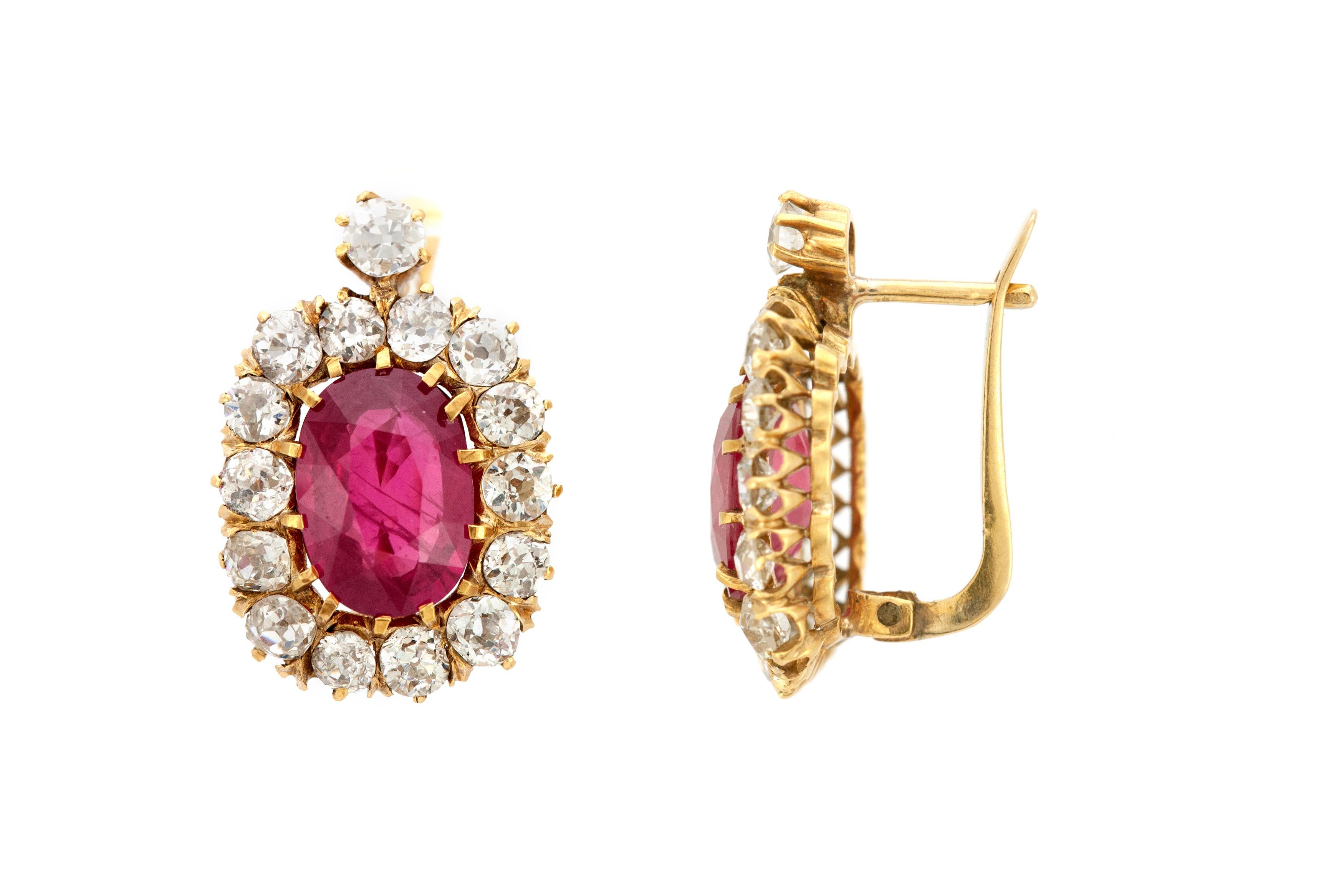 The earrings are finely crafted in 18k yellow gold with rubies weighing approximately a total of 6.21 carat.
One ruby weighs approximately 2.63 and the other one is 3.58 carat.
Diamonds weigh approximately a total of 5.00 carat.