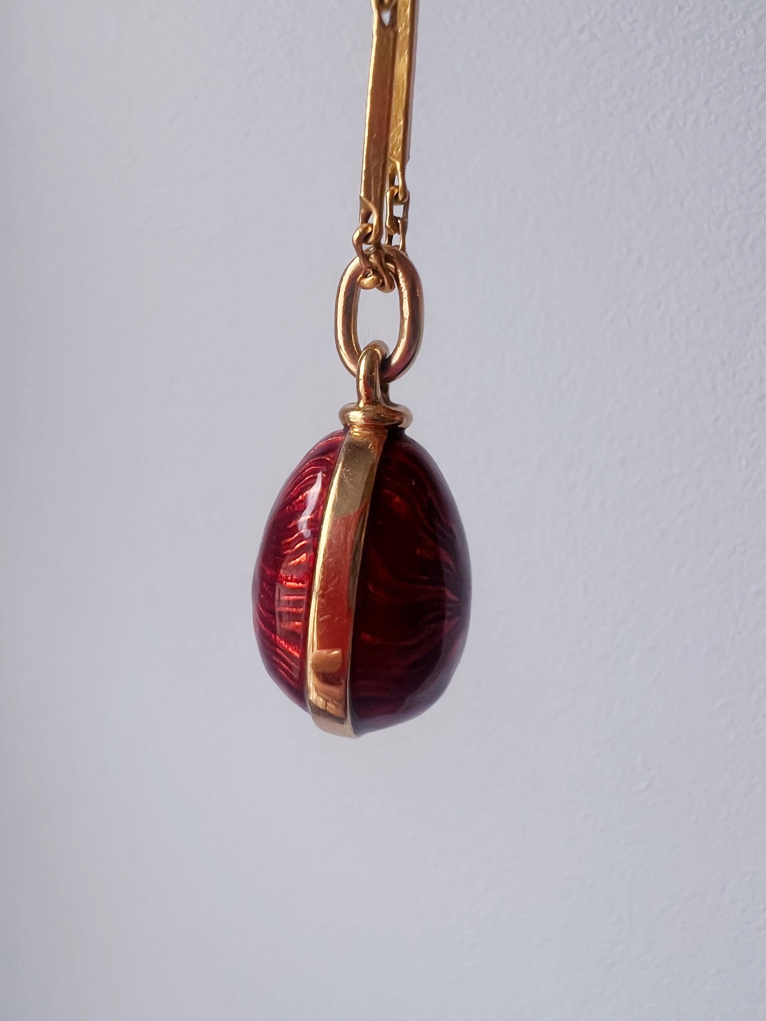 Beautiful Russian style 18K gold red enameled egg pendant 1