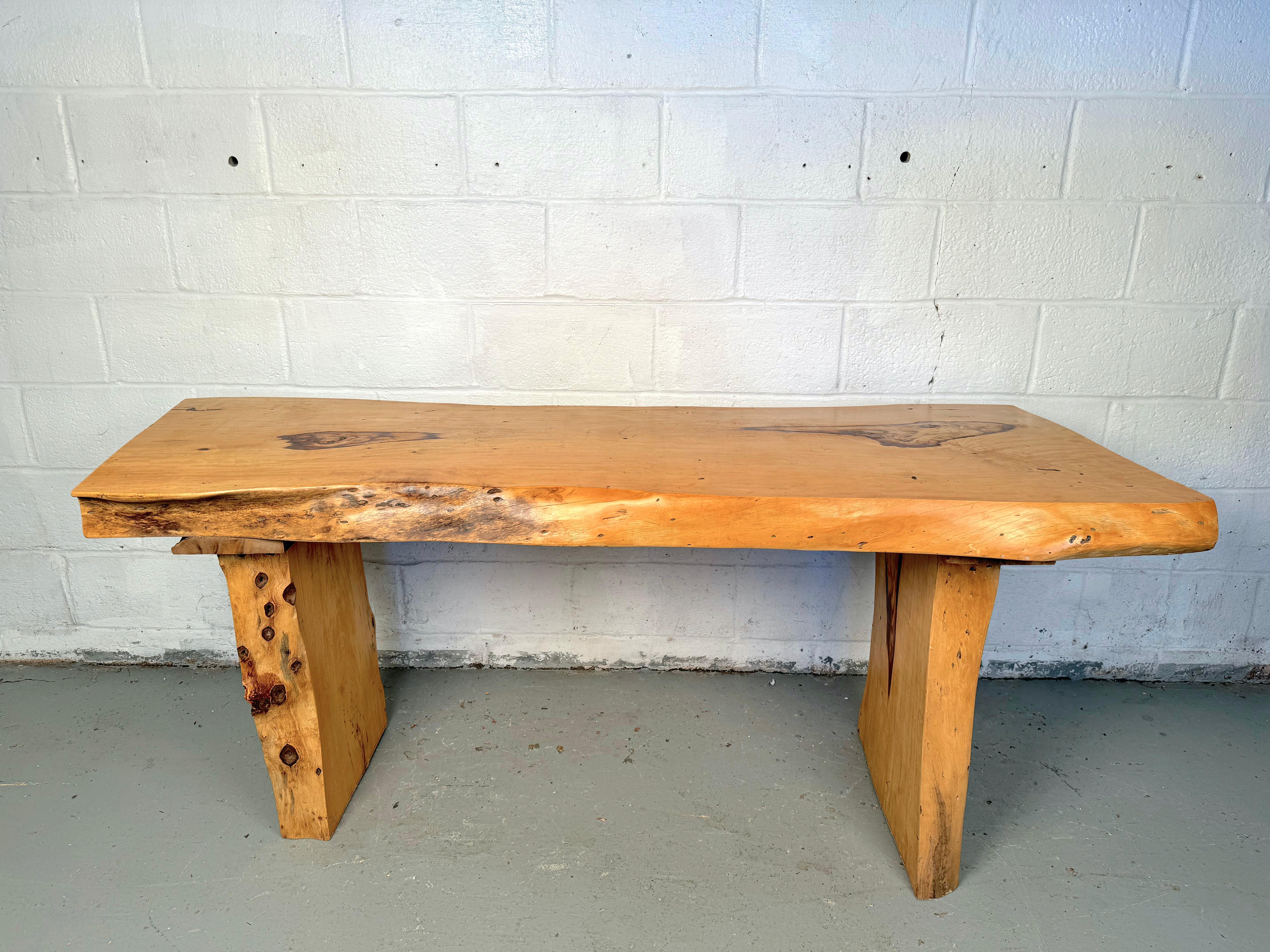 Add a touch of natural beauty and timeless craftsmanship to your home with this Beautiful Rustic Live Edge Console Table. Handcrafted from solid wood, this stunning table showcases the unique, raw beauty of nature with its live edge design, where