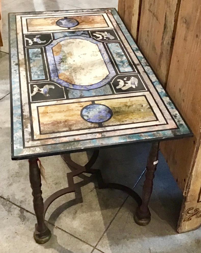 Italian Scagliola table featuring bold colors and intricate details.