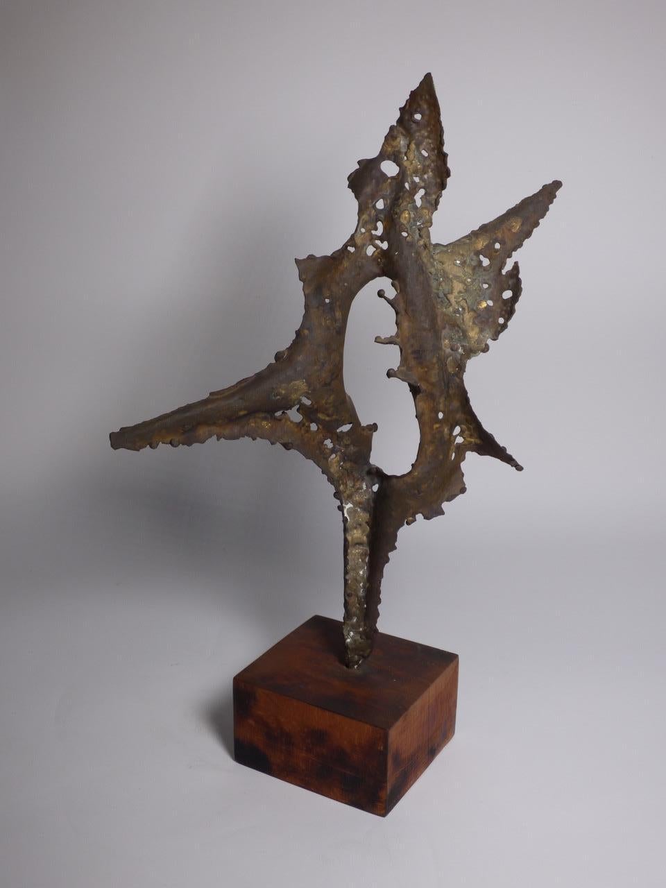 Beautiful sculpture in iron and with wooden base designed by Nino Franchina, 1958, Italy. Unique piece.