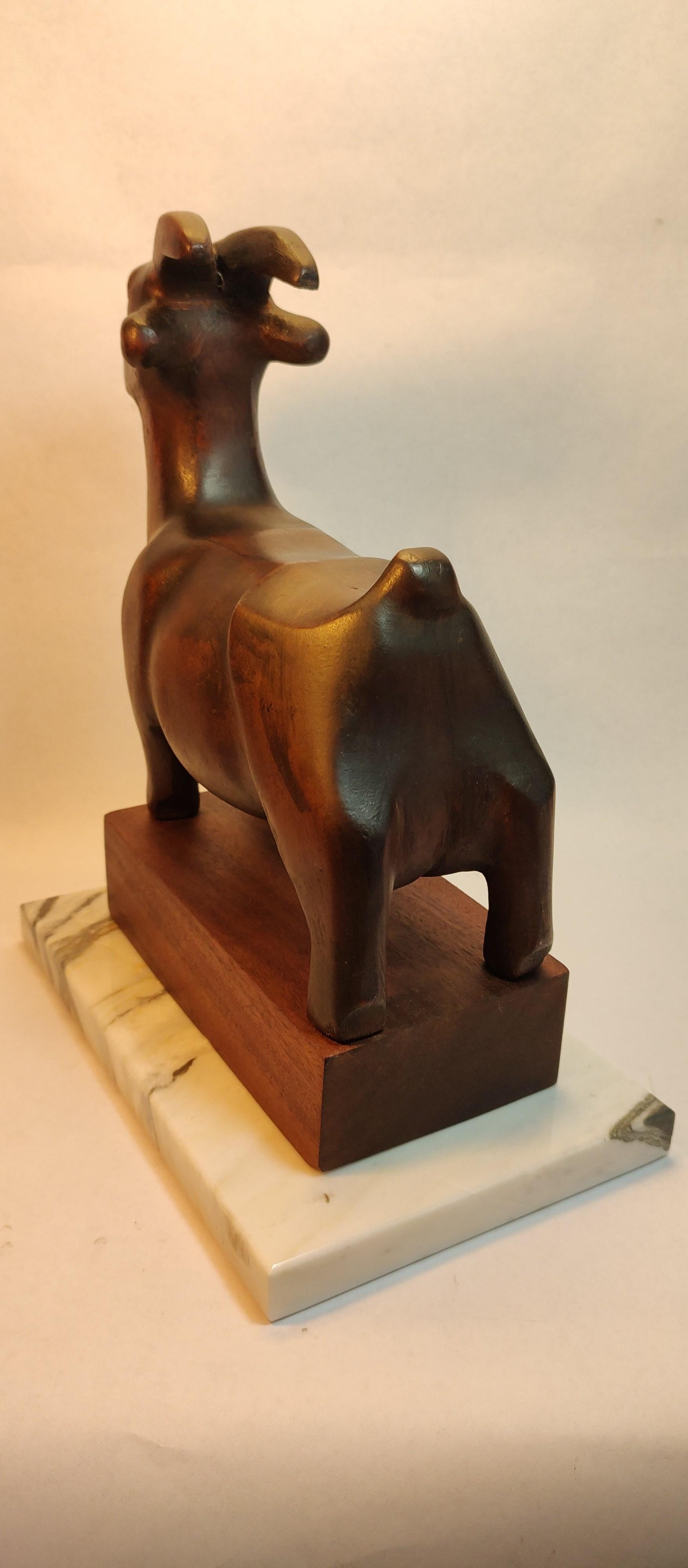 Hand-Carved Beautiful Sculpture of Goat carved in wood by Israeli Artist For Sale