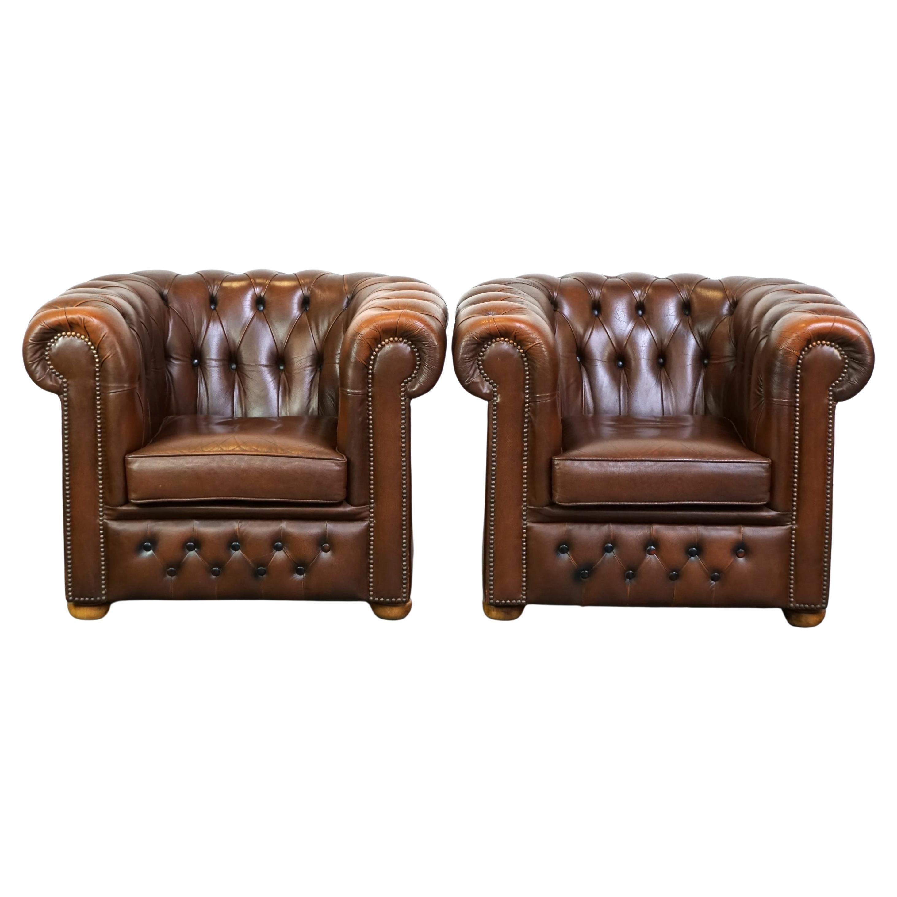 Beautiful set of 2 very wellmaintained brown leather Chesterfield