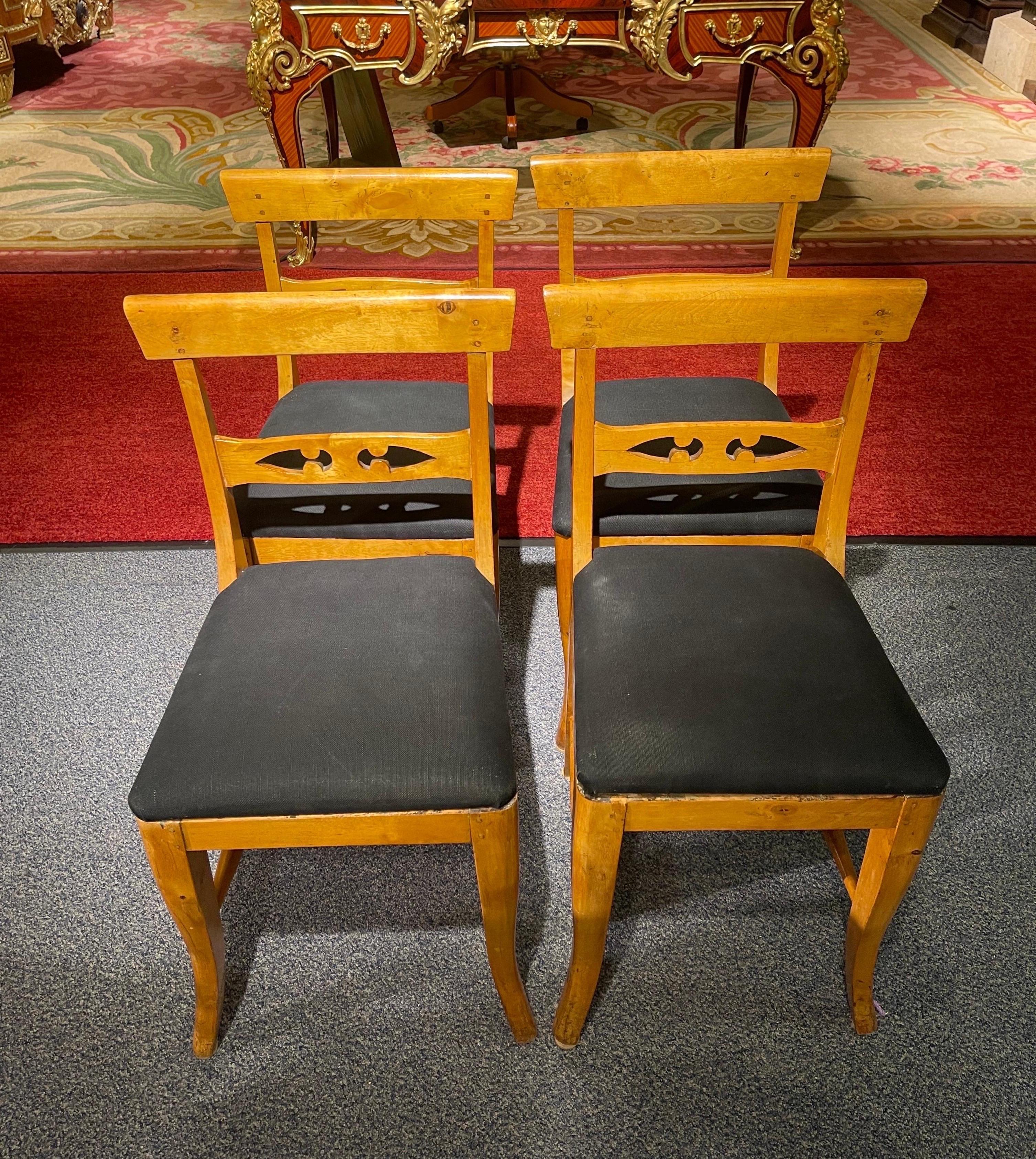 Beautiful set of 4 Biedermeier chairs from around 1860
Solid birch wood. Seat upholstered and covered with black fabric.
Very stable and robust built.