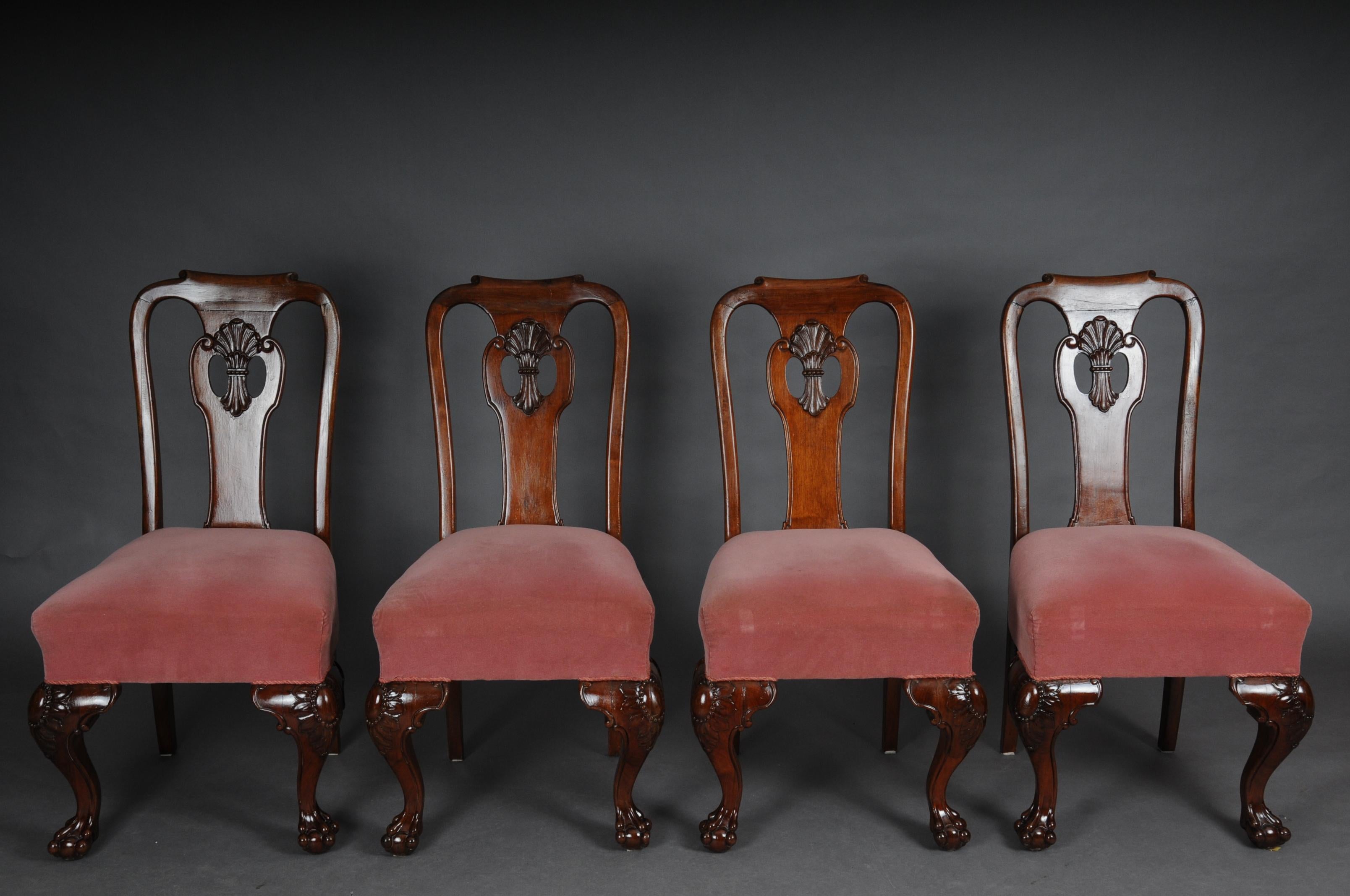 Beautiful set of 4 English baroque chairs, circa 1880.

Solid walnut body. Upholstered seat on carved feet ending in dancing. Curly and carved backrest.

(C-159).