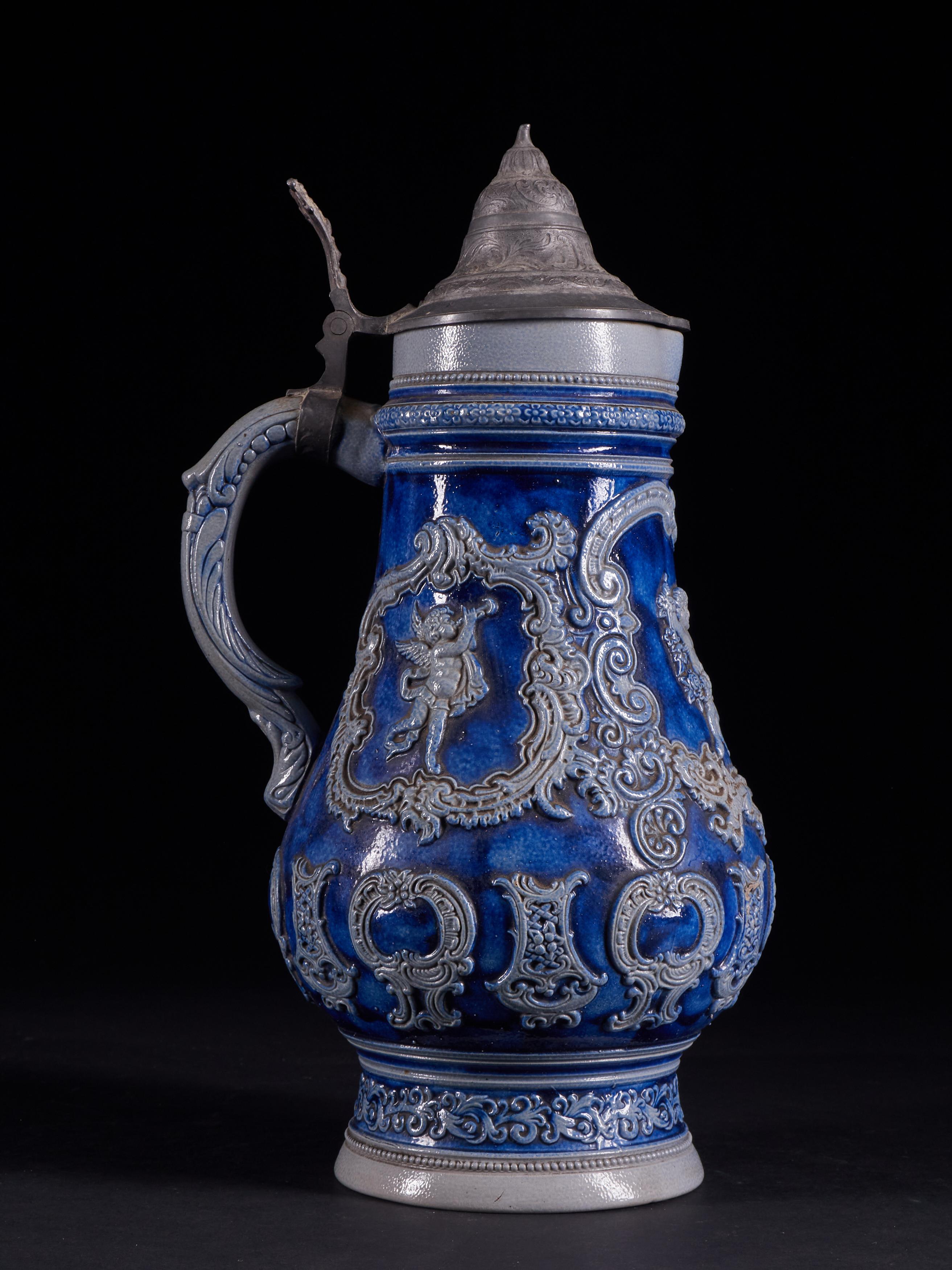 Beautiful Set of 4 Vintage Ceramic Beer Carafes with Indigo Blue Decorations In Good Condition In Leuven , BE