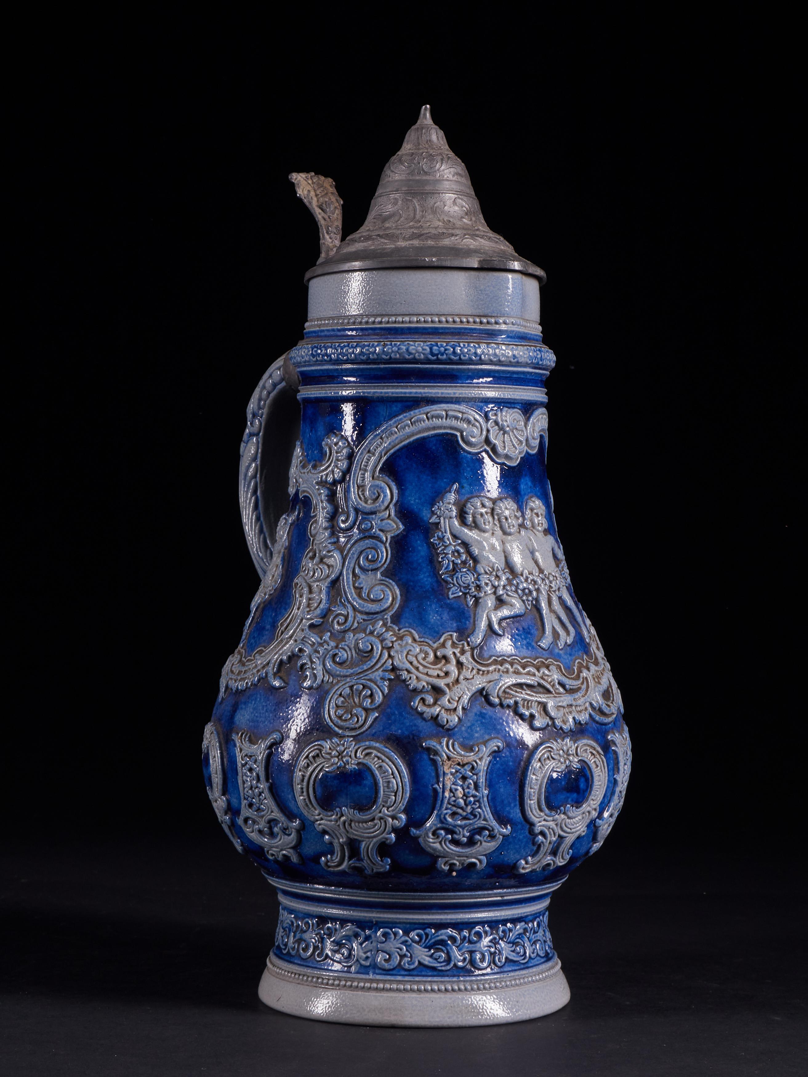 20th Century Beautiful Set of 4 Vintage Ceramic Beer Carafes with Indigo Blue Decorations