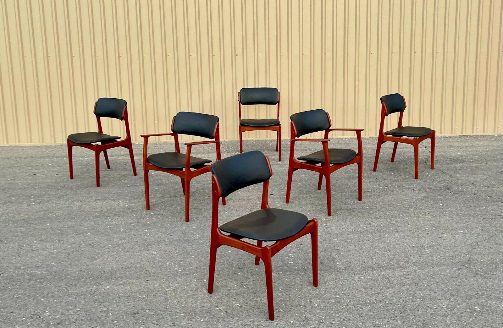 Six beautiful mid century model #49 & 50 teak dining chairs by Danish designer Erik Buch for O.D. Mobler AS, circa 1960s. Buch’s organic and functional aesthetic are showcased in these beautifully crafted modern teak dining chairs. This rare set of