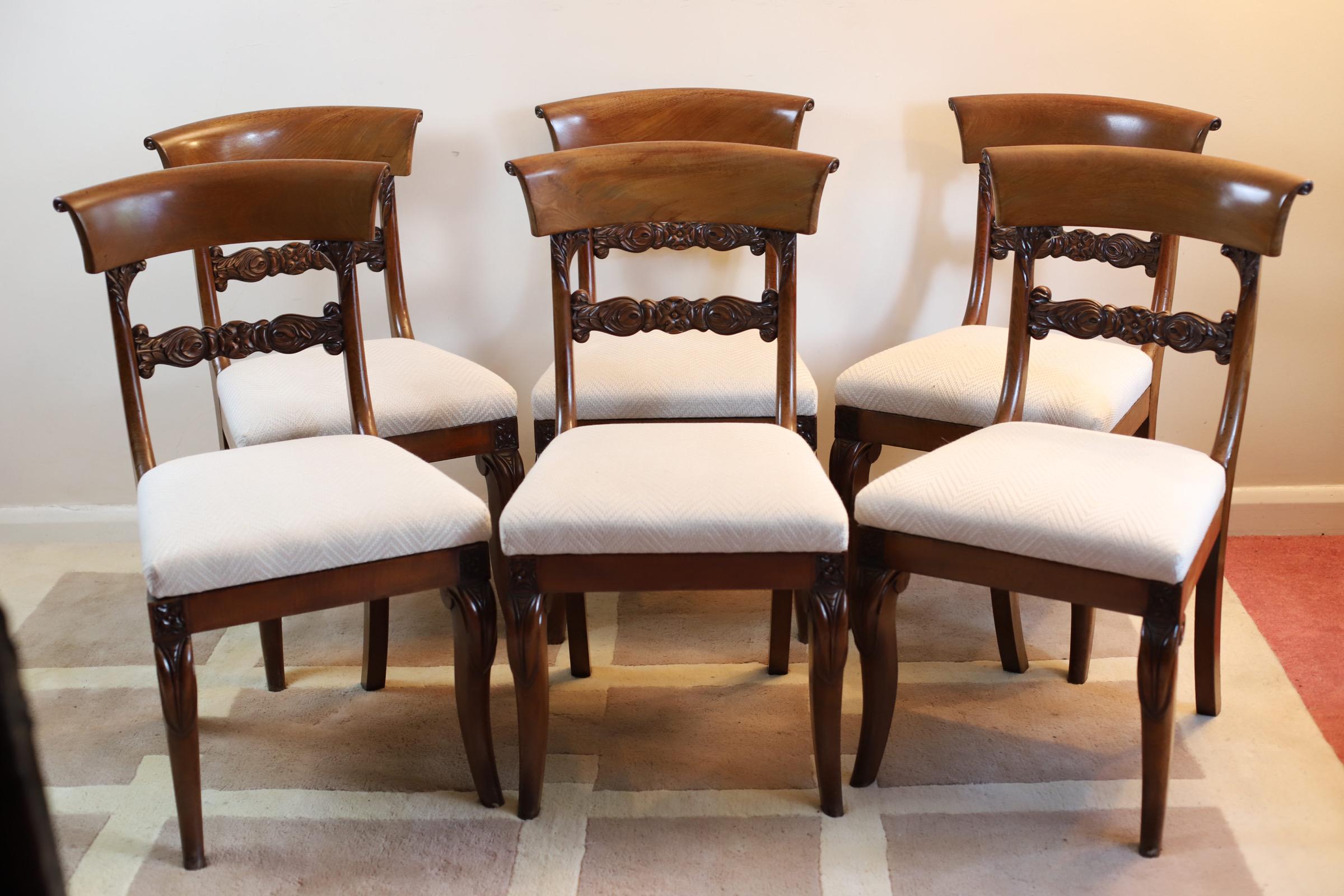 Beautiful Set Of 6 William IV hardwood  Dining Chairs with carved mid rails and upholstered drop in seats raised on sabre supports.


Some historic extinct woodworm holes (under the seat so not visible in use) that have been treated for good