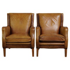 Beautiful set of leather armchairs in light cognac color, English style