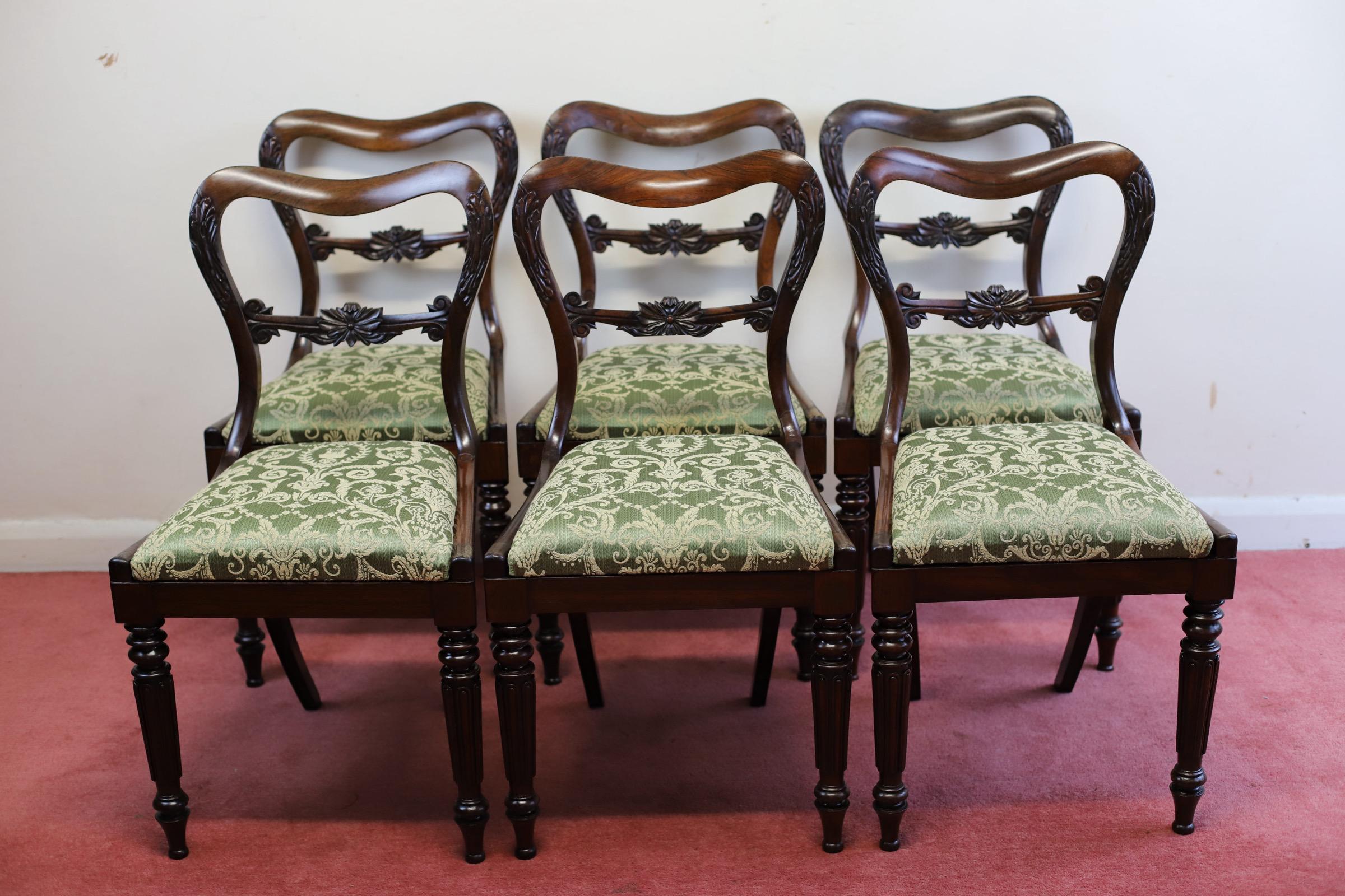 We delight to offer for sale this amazing early Victorian set of six rosewood dining chairs , with acanthus and floral carved open backs above drop-in seats, raised on turned and tapered reeded legs , circa 1830. 
Some repairs has been made in the