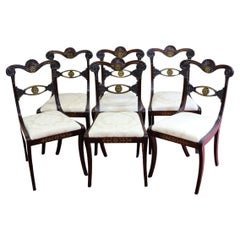 Magnifique ensemble de six chaises de salle à manger Regency en bois dur et laiton incrusté