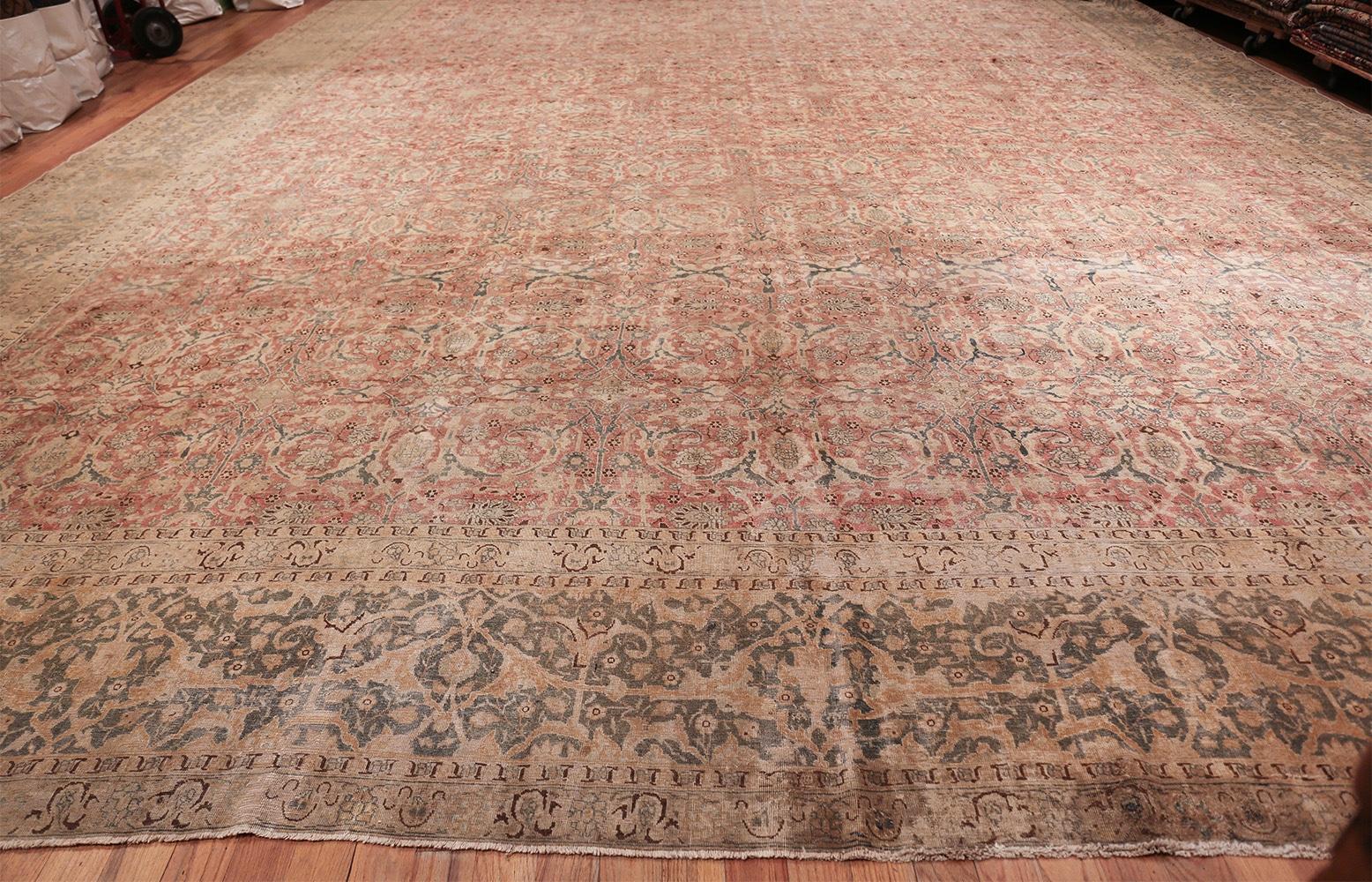 Nazmiyal Collection Antique Persian Tabriz Rug.   17 ft 7 in x 27 ft 7 in In Distressed Condition In New York, NY