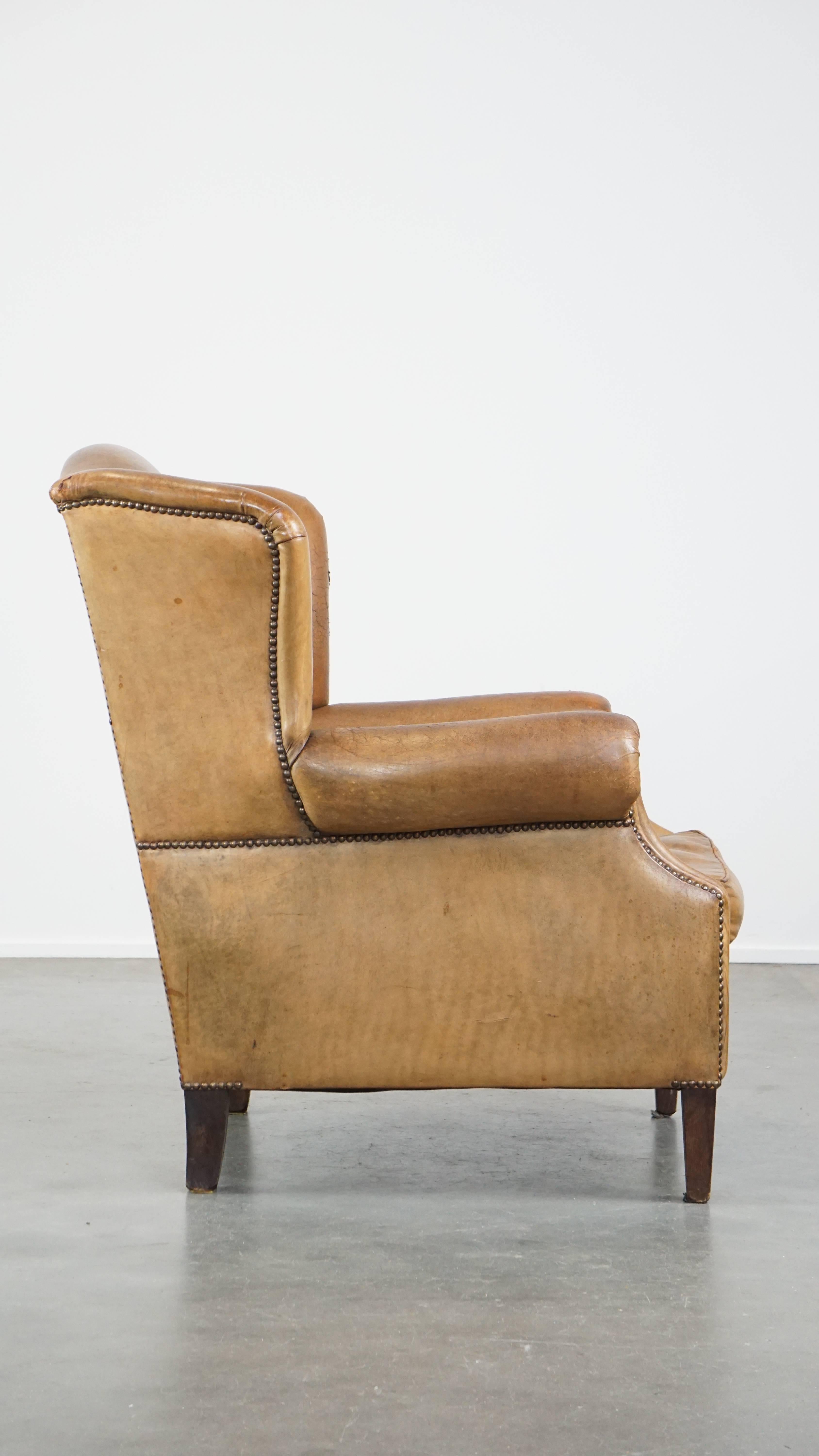 Hand-Crafted Beautiful sheepskin armchair with a very lovely color and patina For Sale