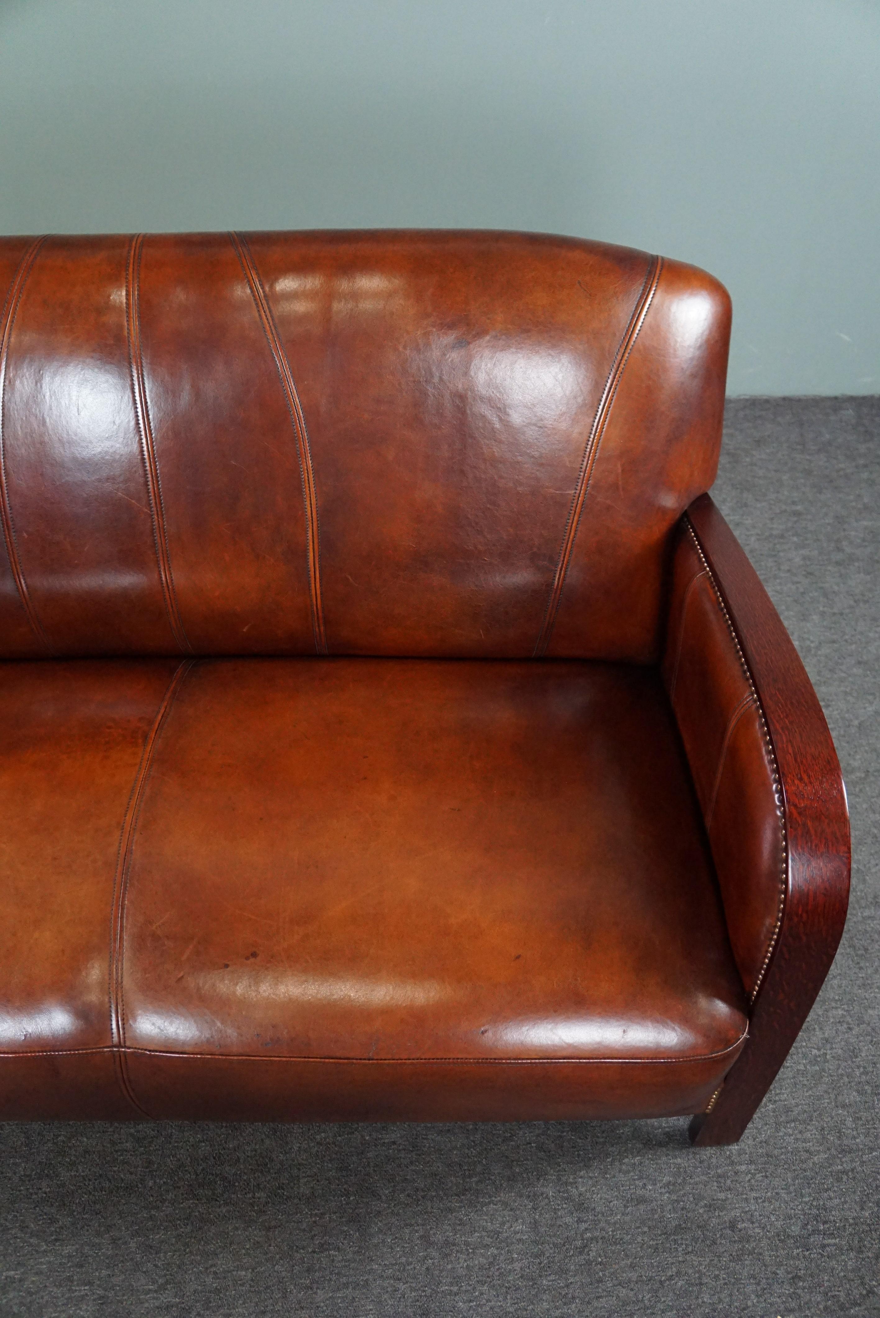 Beautiful sheepskin Art Deco 2-seater sofa, new condition In Good Condition For Sale In Harderwijk, NL
