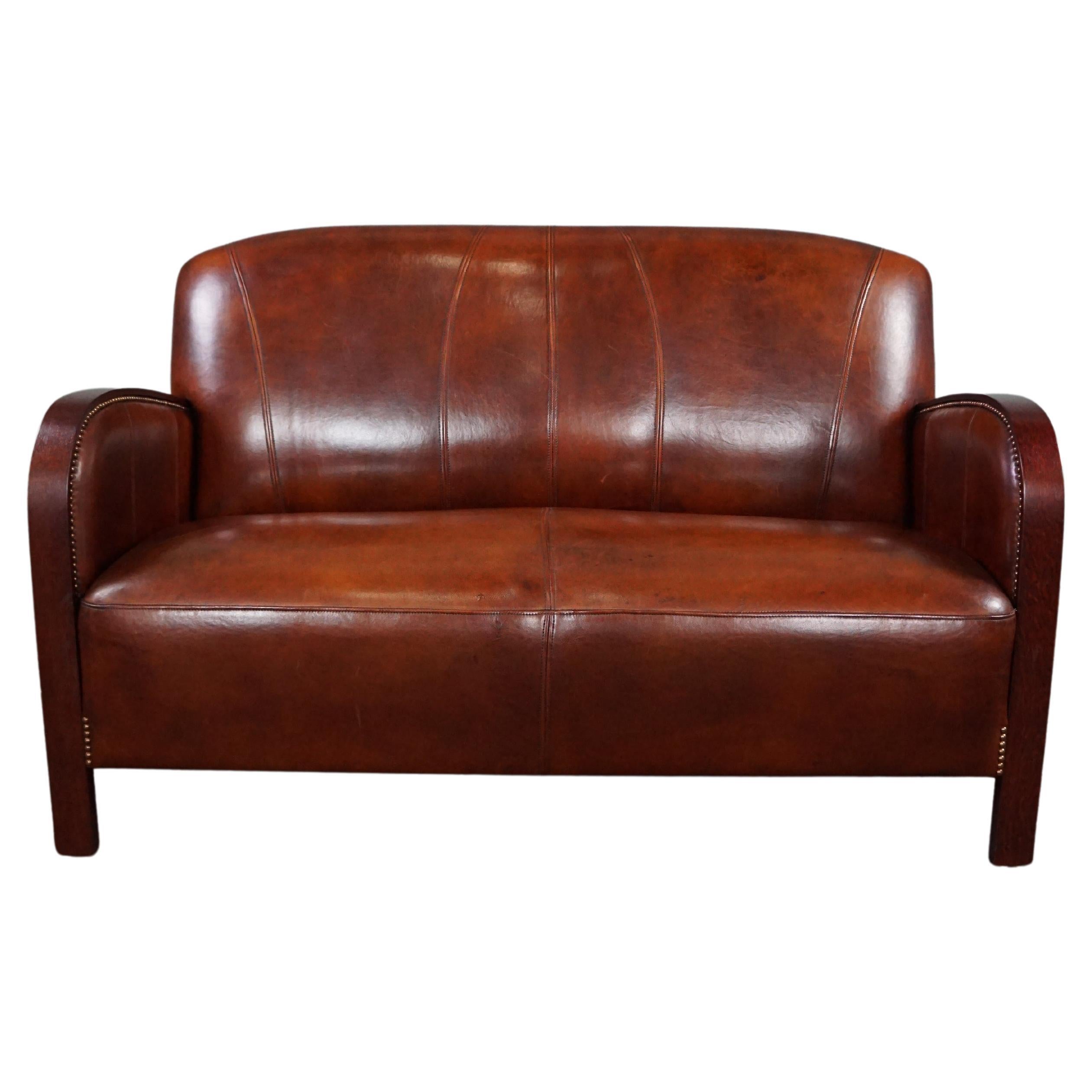 Beautiful sheepskin Art Deco 2-seater sofa, new condition For Sale