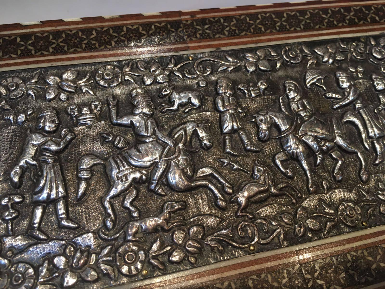 Beautiful Shiraz, Qajar Khatem Kari silver on wood box. Measures: height 7.5cm
width 22cm.