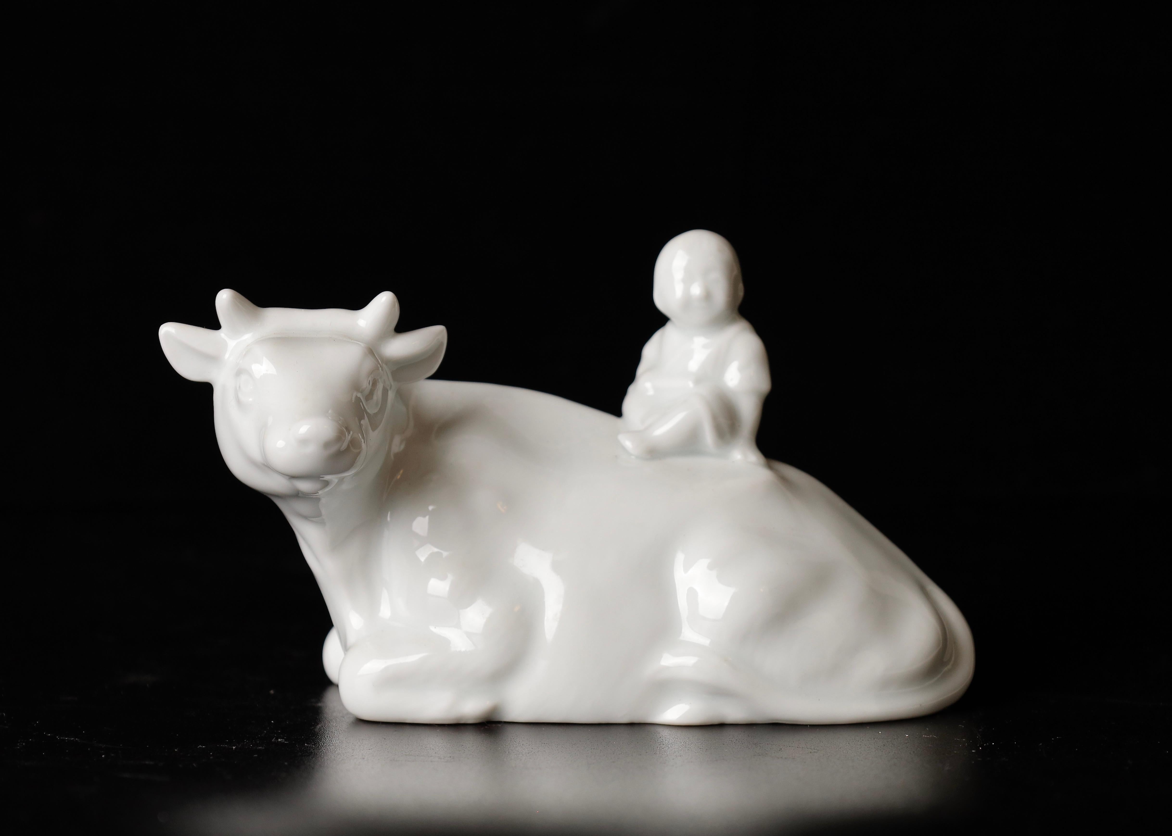 Beautiful miniature Porcelain figure of a boy riding a bull 
Very good condition
Mid 20 th century 
Size: 14.5cm x7.5cm H 8.5cm cm / 5.7x 3 inch, H. 3.3 inch 
Weight: 150g ( 0.33 lb).