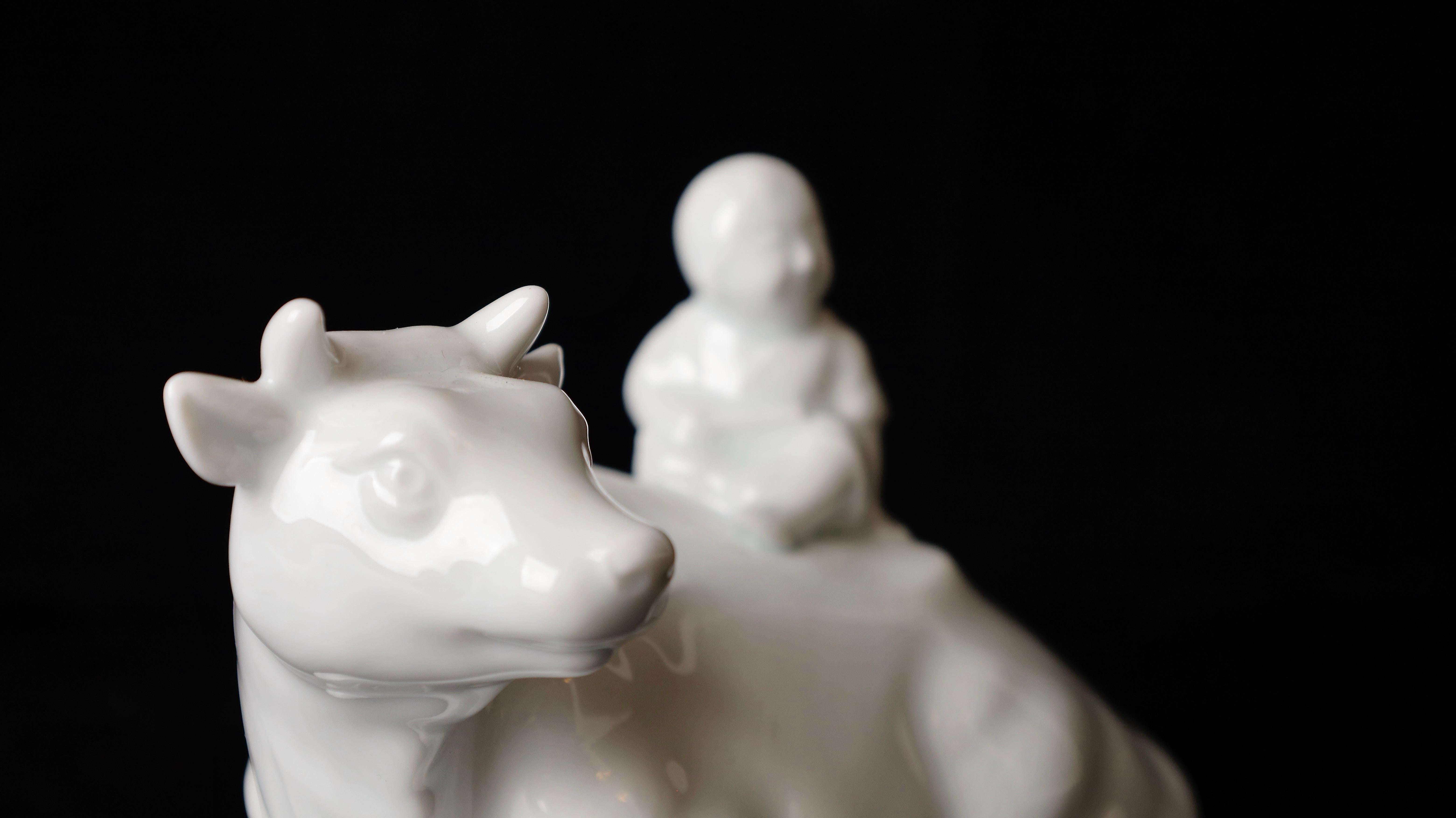Japanese Beautiful Signed Miniature Porcelain of Boy Riding the Bull Okimono For Sale