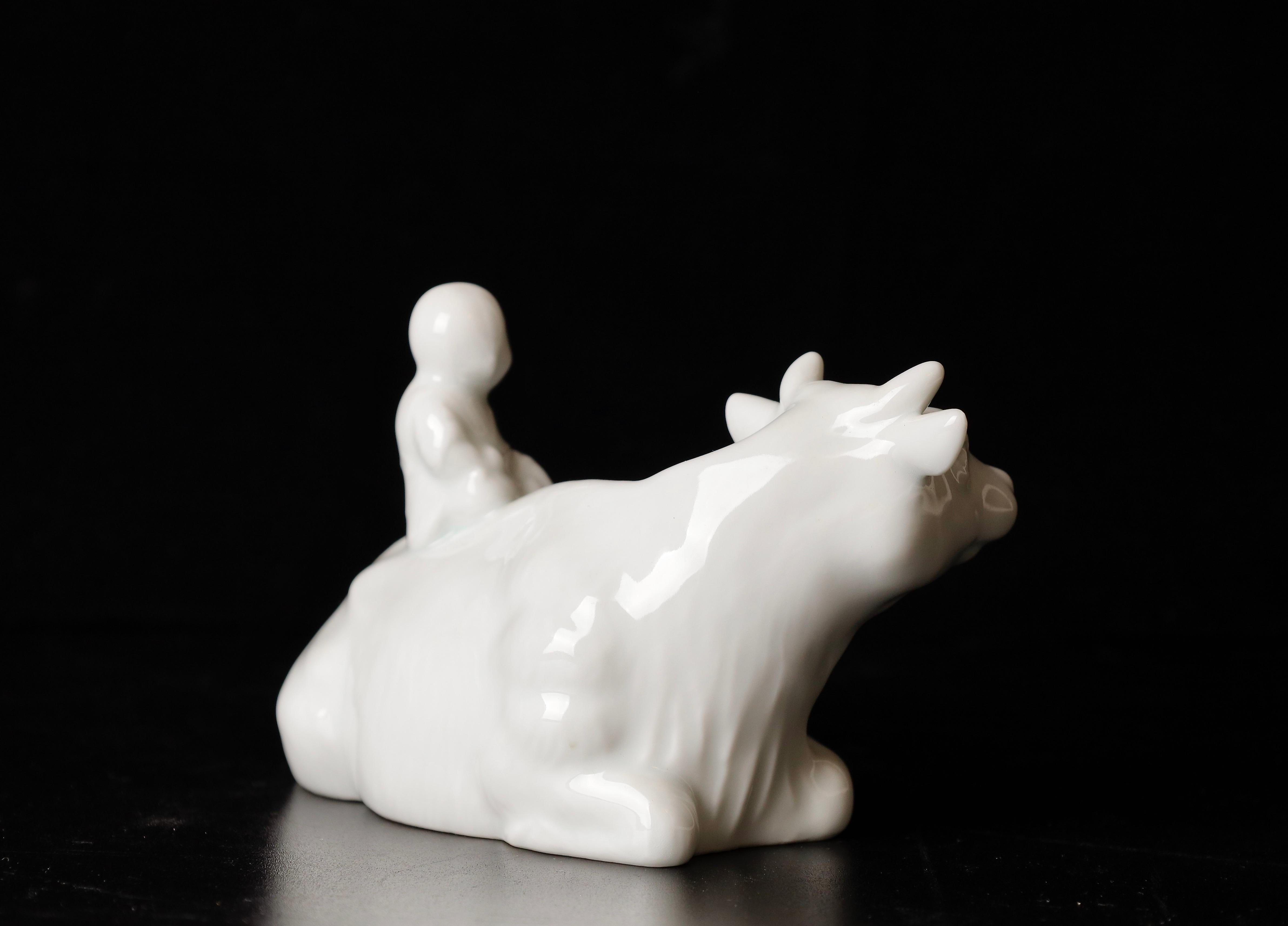 20th Century Beautiful Signed Miniature Porcelain of Boy Riding the Bull Okimono For Sale