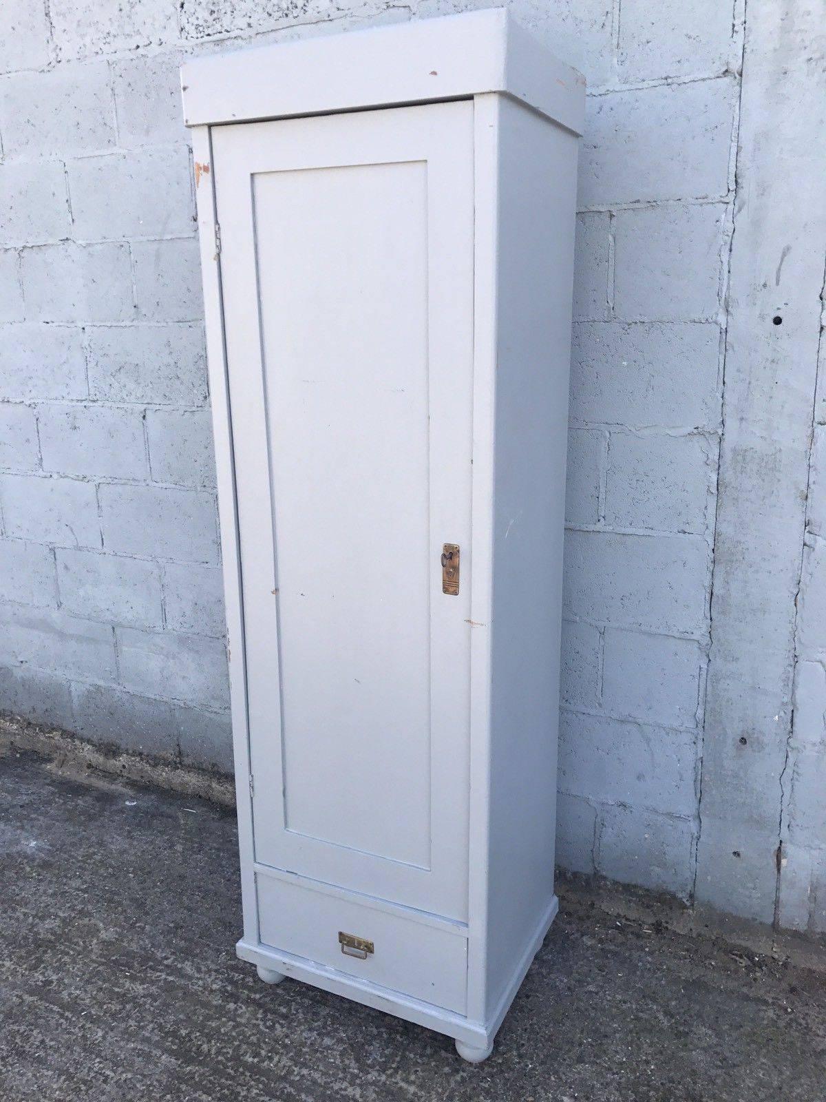 This is a beautiful French larder/cupboard or wardrobe.

It's been painted in grey color, slightly distressed.

Single carved door opens up to good storage. Can be fitted with shelves or hanging rails as an extra, if needed.

Dimensions- 62cm
