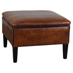 Beautiful-sized sheepskin leather ottoman with a stunning warm color