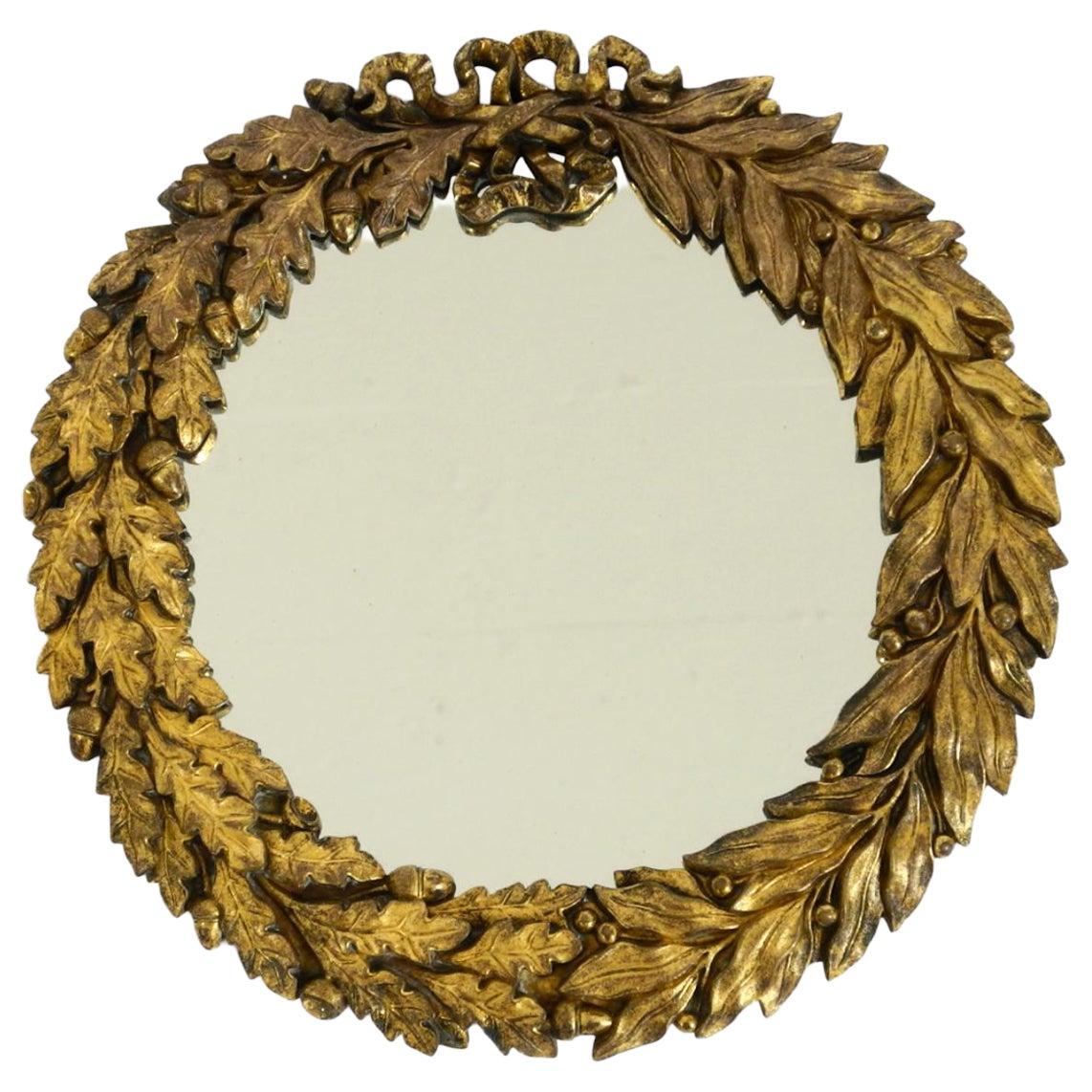 Beautiful small French mid-century wall mirror with an ornate brass frame For Sale