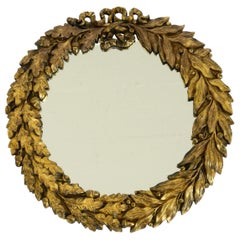 Beautiful small French mid-century wall mirror with an ornate brass frame