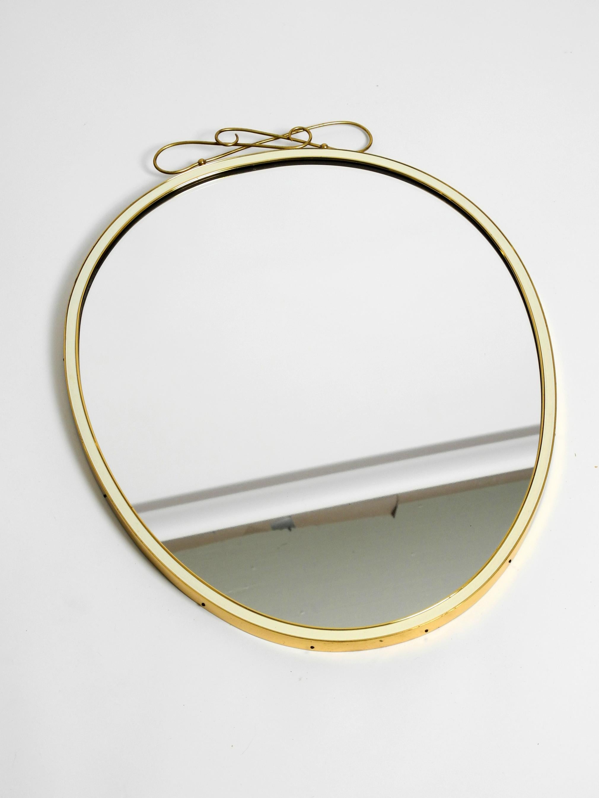Beautiful Small Heavy Mid-Century Brass Wall Mirror by Münchener Zierspiegel For Sale 12