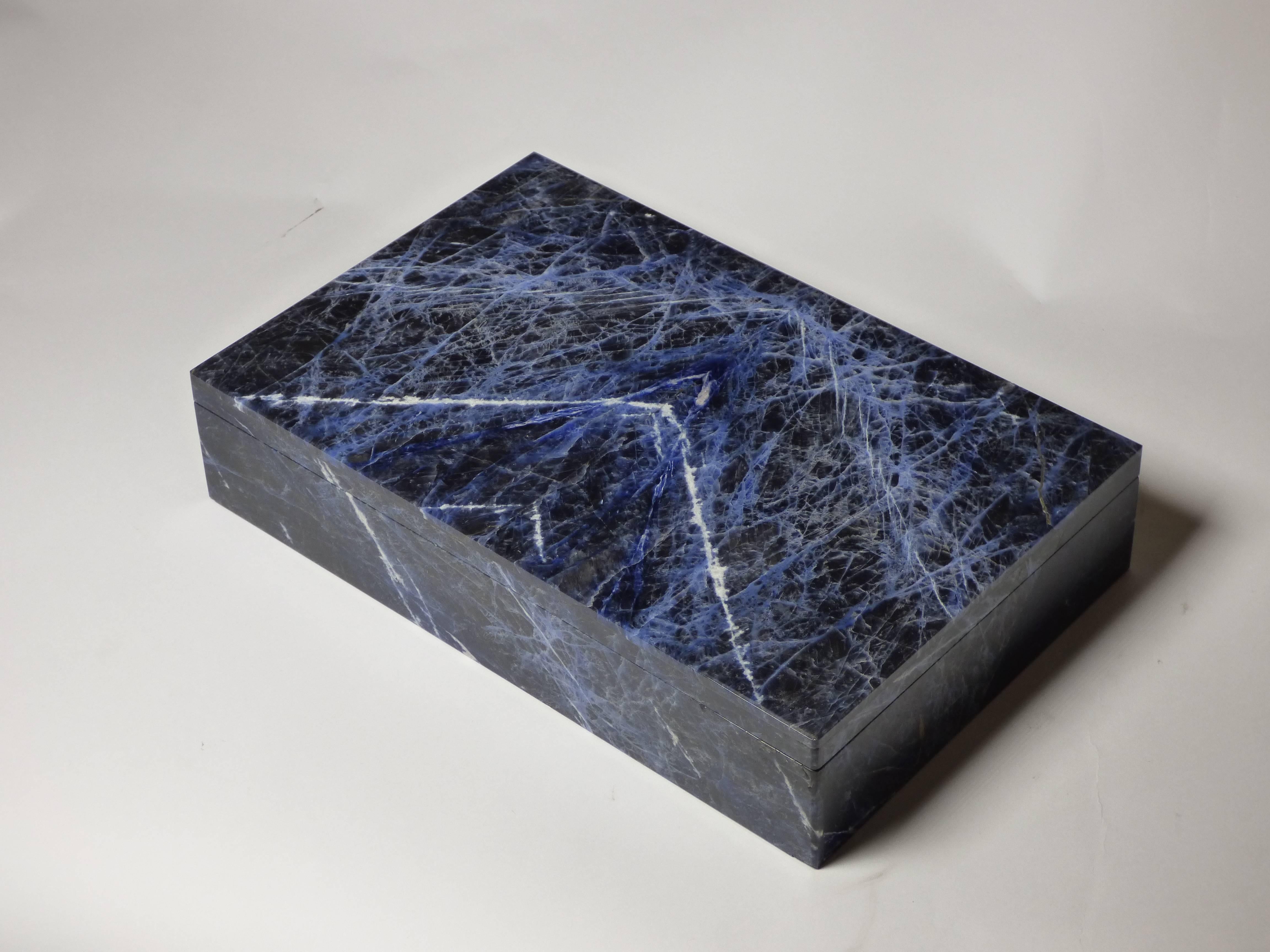 An elegant Sodalite box produced in Italy for Studio Superego with mosaic structure. Unique piece. Original label.

Biography
Superego editions was born in 2006, performing a constant activity of research in decorative arts by offering both
