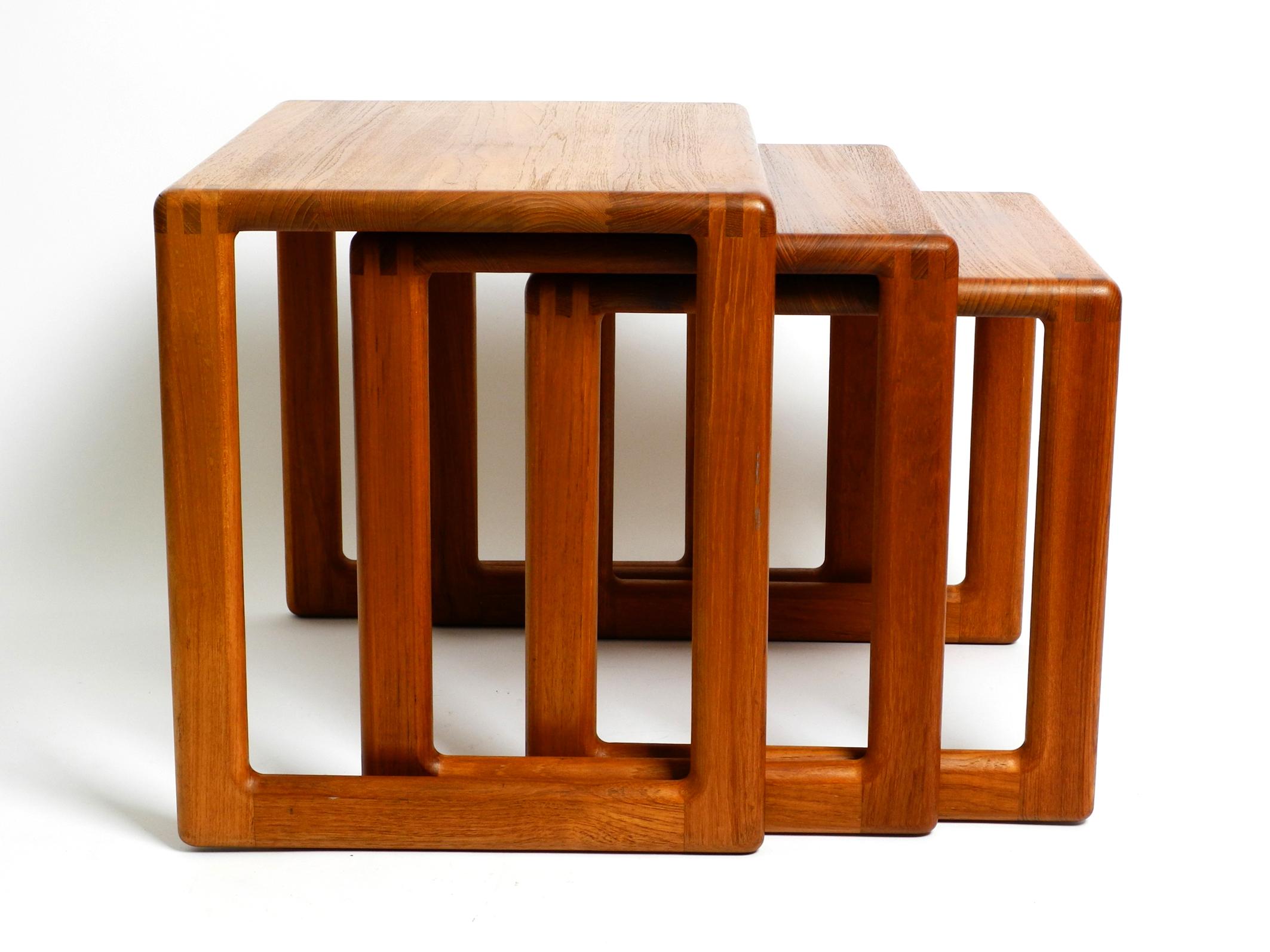 Original 60's solid teak 3 piece nesting set. 
Scandinavian production. Without manufacturer's label.
Beautiful minimalist design. Very good workmanship. Built to last.
The edges are joint by mortise and tenon and glue. Nothing screwed. Looks very