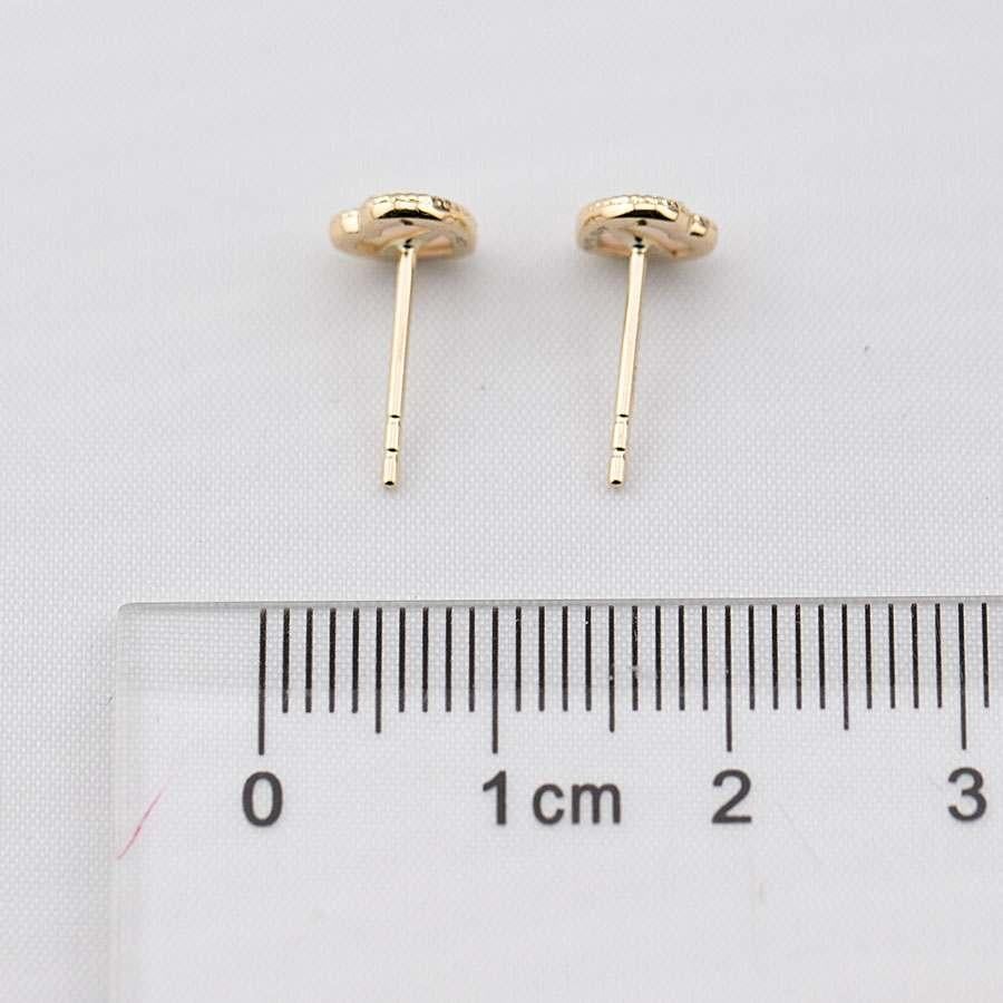 Magnifiques clous d'oreilles en or jaune 14 carats à motif de cœur torsadé Neuf - En vente à Suwanee, GA