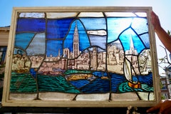Beautiful Stained Glass Window with a View of the Old Antwerp with the Cathedral