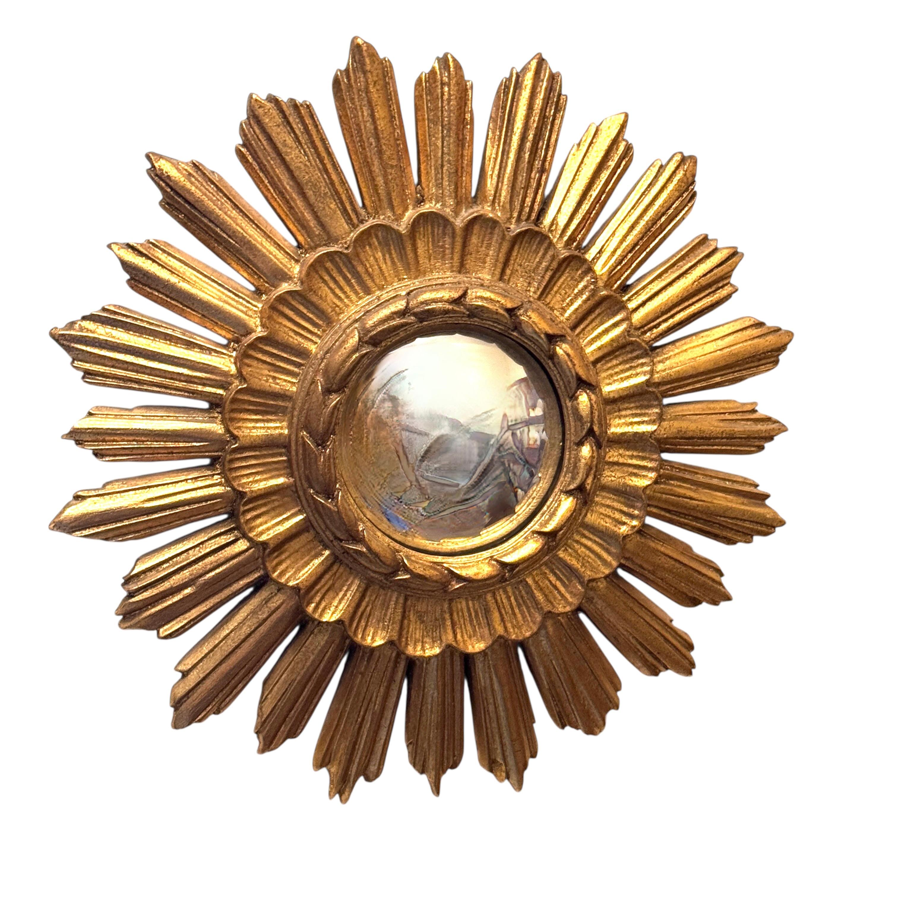 Hollywood Regency Beautiful Starburst Sunburst Gilded Resin Convex Mirror Belgium, circa 1960s For Sale