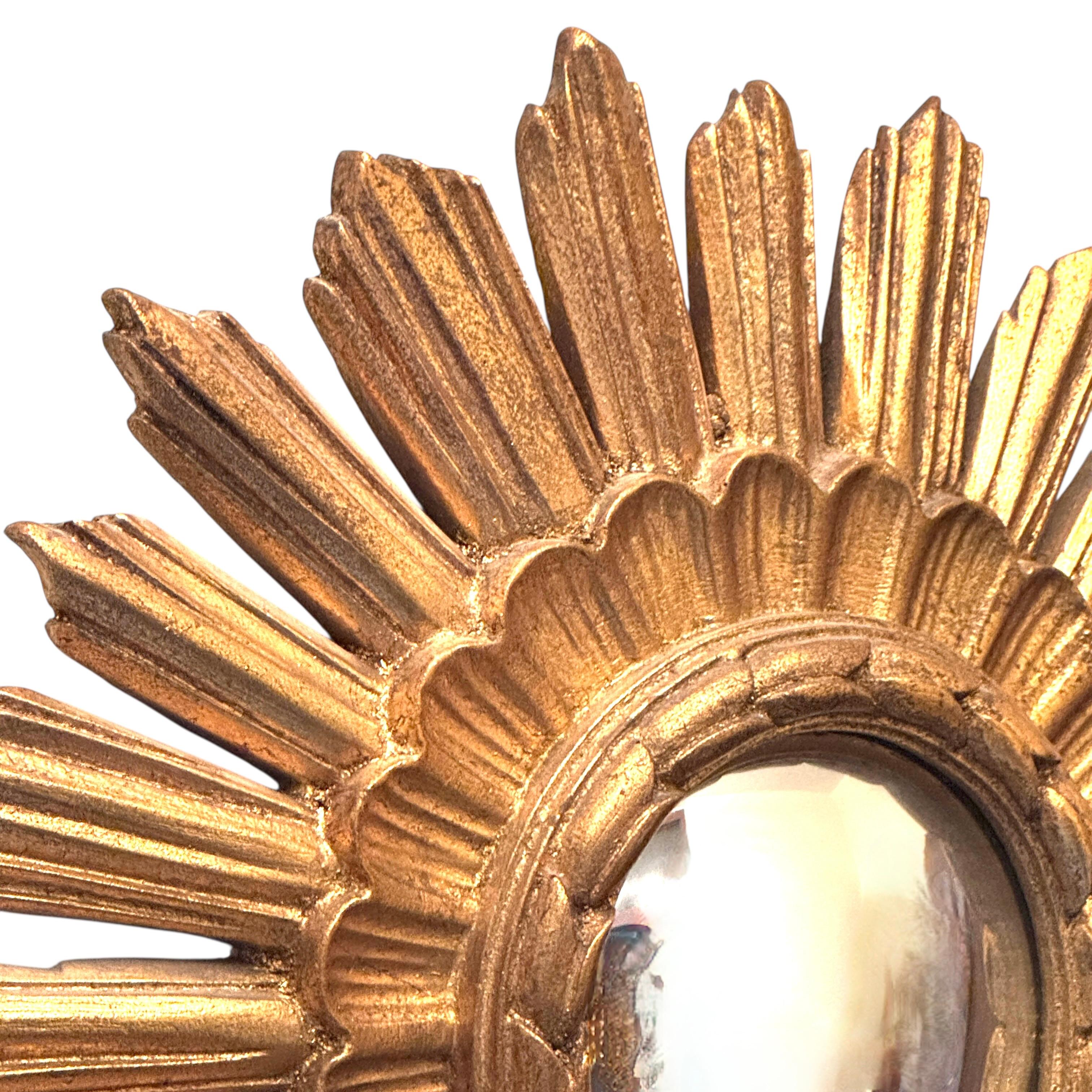 Gilt Beautiful Starburst Sunburst Gilded Resin Convex Mirror Belgium, circa 1960s For Sale