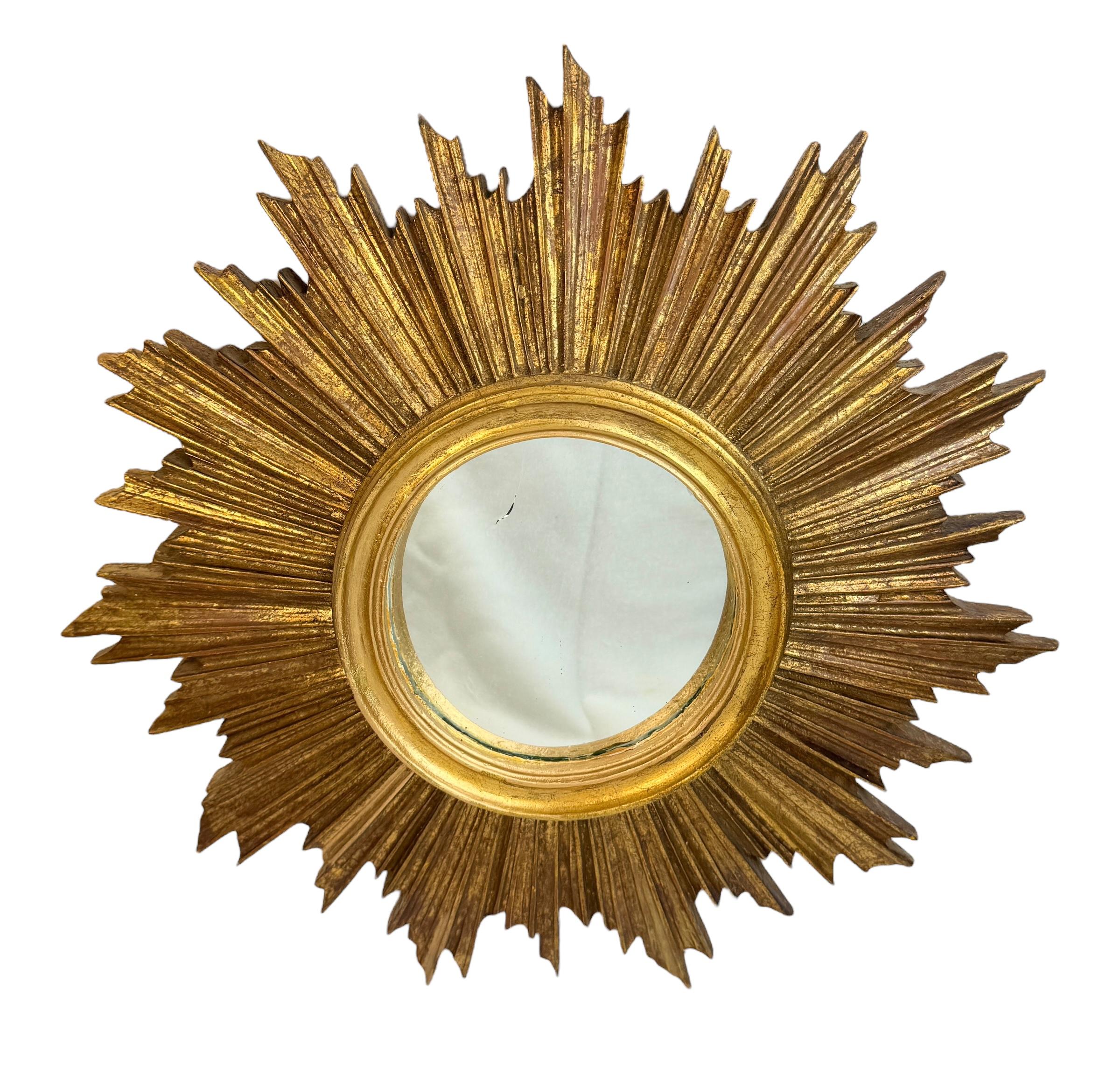 Hollywood Regency Beautiful Starburst Sunburst Gilded Resin Convex Mirror Belgium, circa 1970s For Sale